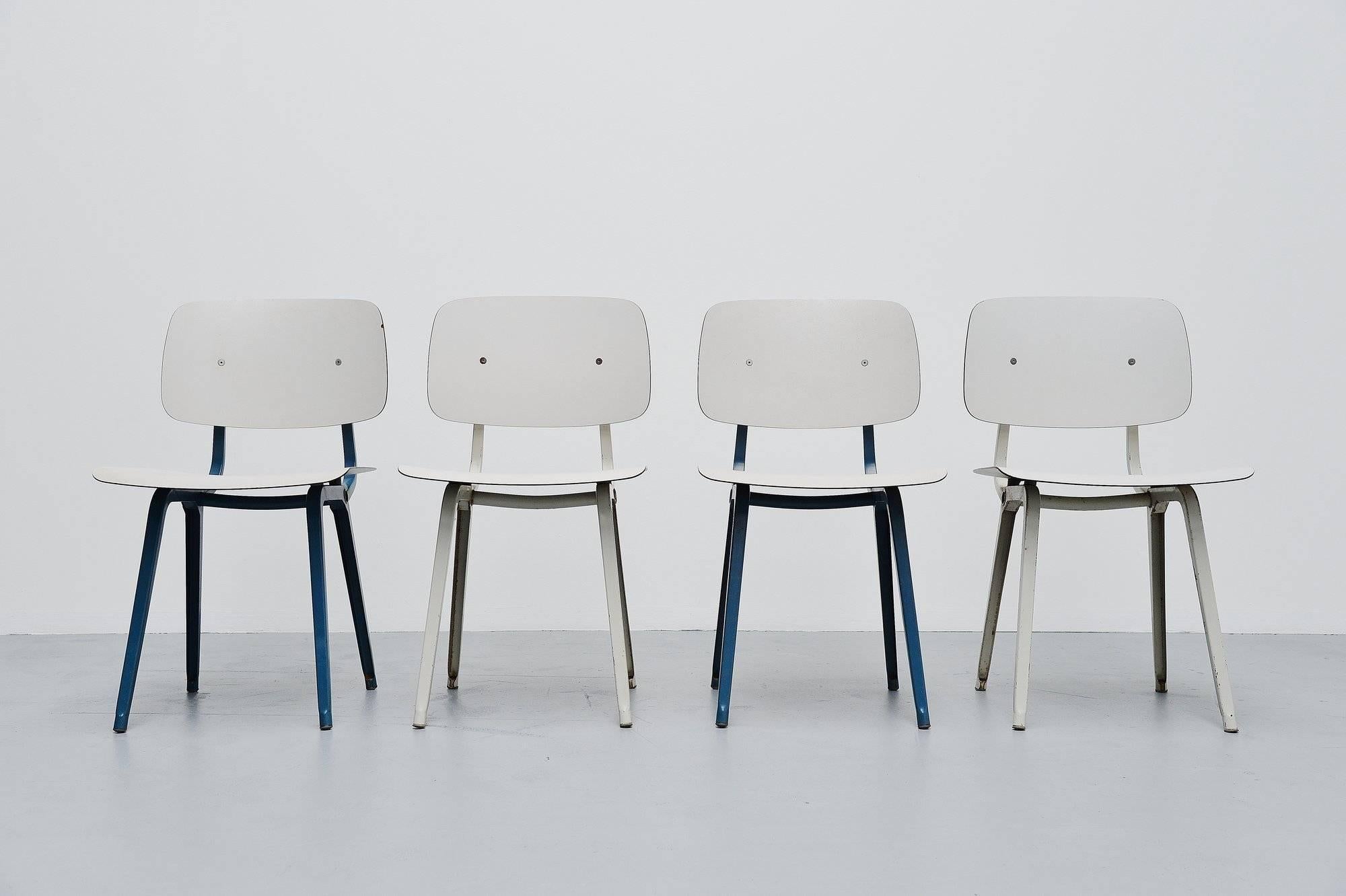 Nice set of four Revolt chairs designed by Friso Kramer for Ahrend de Cirkel, Holland 1953. Though the Revolt chair was already designed in 1953, the production started in 1958. The chairs have a folded metal base which is very strong and a ciranol