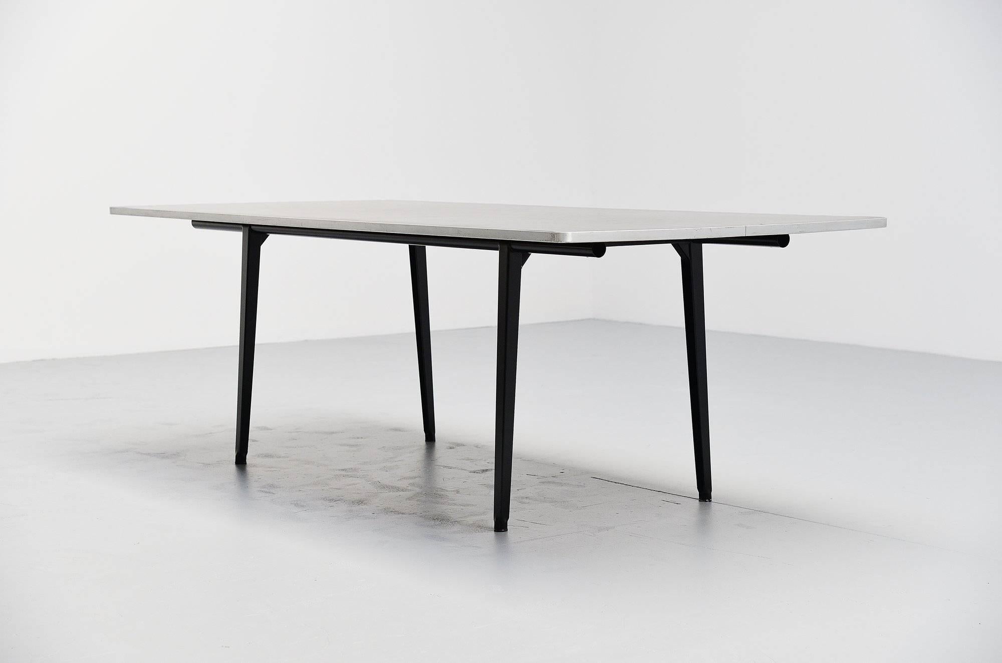 Nice and rare Industrial table designed by Friso Kramer for Ahrend de Cirkel, Holland, 1955. This example is from March 1962, stamped at the bottom of the table top. This table is the largest version made, 240 cm. This is the nicest version with