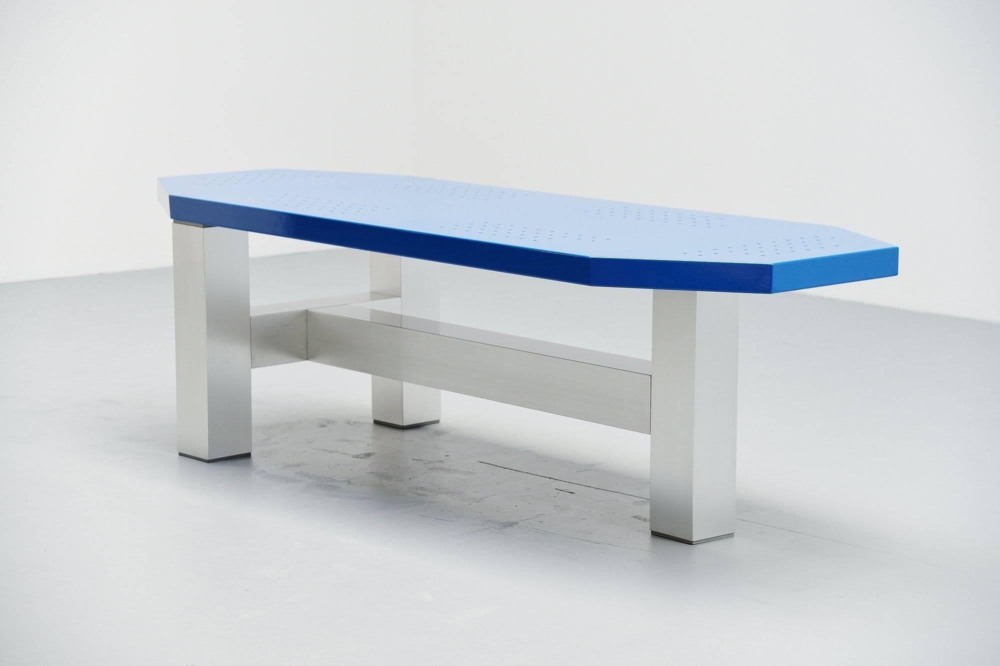 Rare modernist table designed by Martin Visser and Joke van der Heyden, manufactured by ’t Spectrum Bergeyk, 1988. This table is model number TE20 which is the largest size and it has an aluminium base and a blue cold-painted top with die cut dot