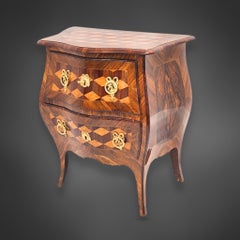 Rare small Rococo commode, cube marquetry, second half 18th century.