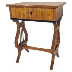 Biedermeier lyre-back table, cherrywood, circa 1825