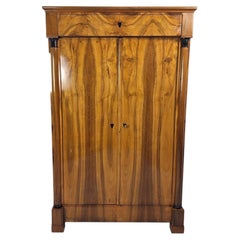 Biedermeier half-cabinet (Vertiko) with half-columns, walnut, Germany circa 1820