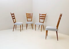 Set of 4 wooden chairs by Paolo Buffa from the 1950s, featuring elegant carved details