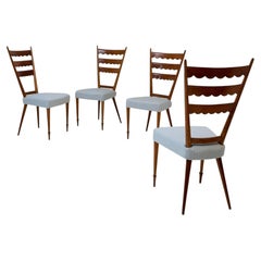 Set of 4 wooden chairs by Paolo Buffa from the 1950s, featuring elegant carved details