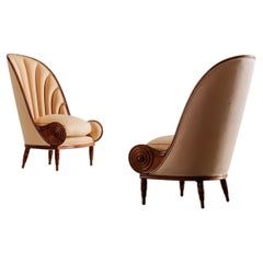 Paire de fauteuils « Nautilus » de Paul Iribe, années 70, en bois sculpté