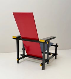 Gerrit T. Rietveld's 635 "Red and Blue" Armchair for Cassina, in lacquered wood