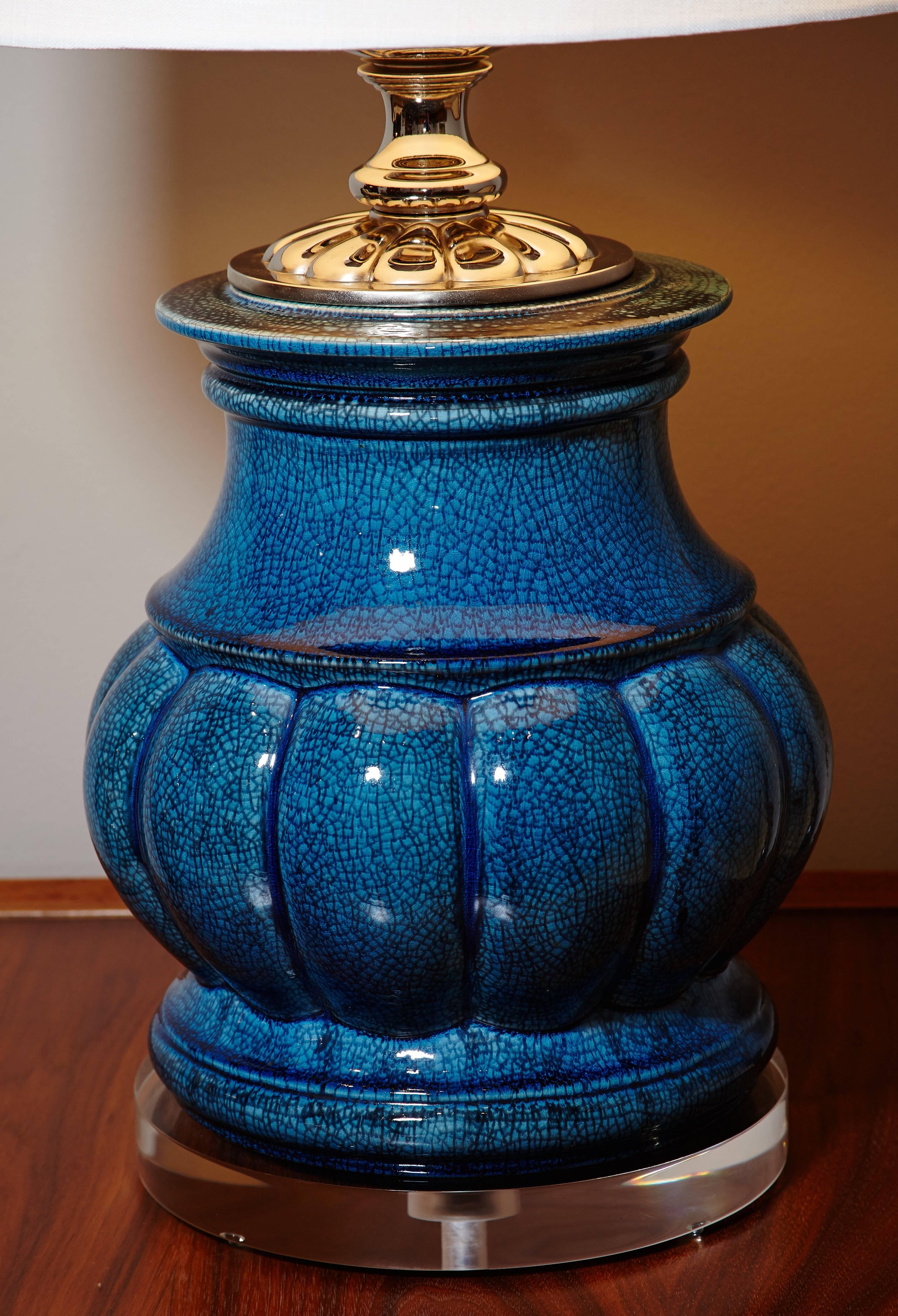 Beautiful turquoise crackle glaze with the original metal mounts now nickel-plated and mounted on a custom Lucite base.