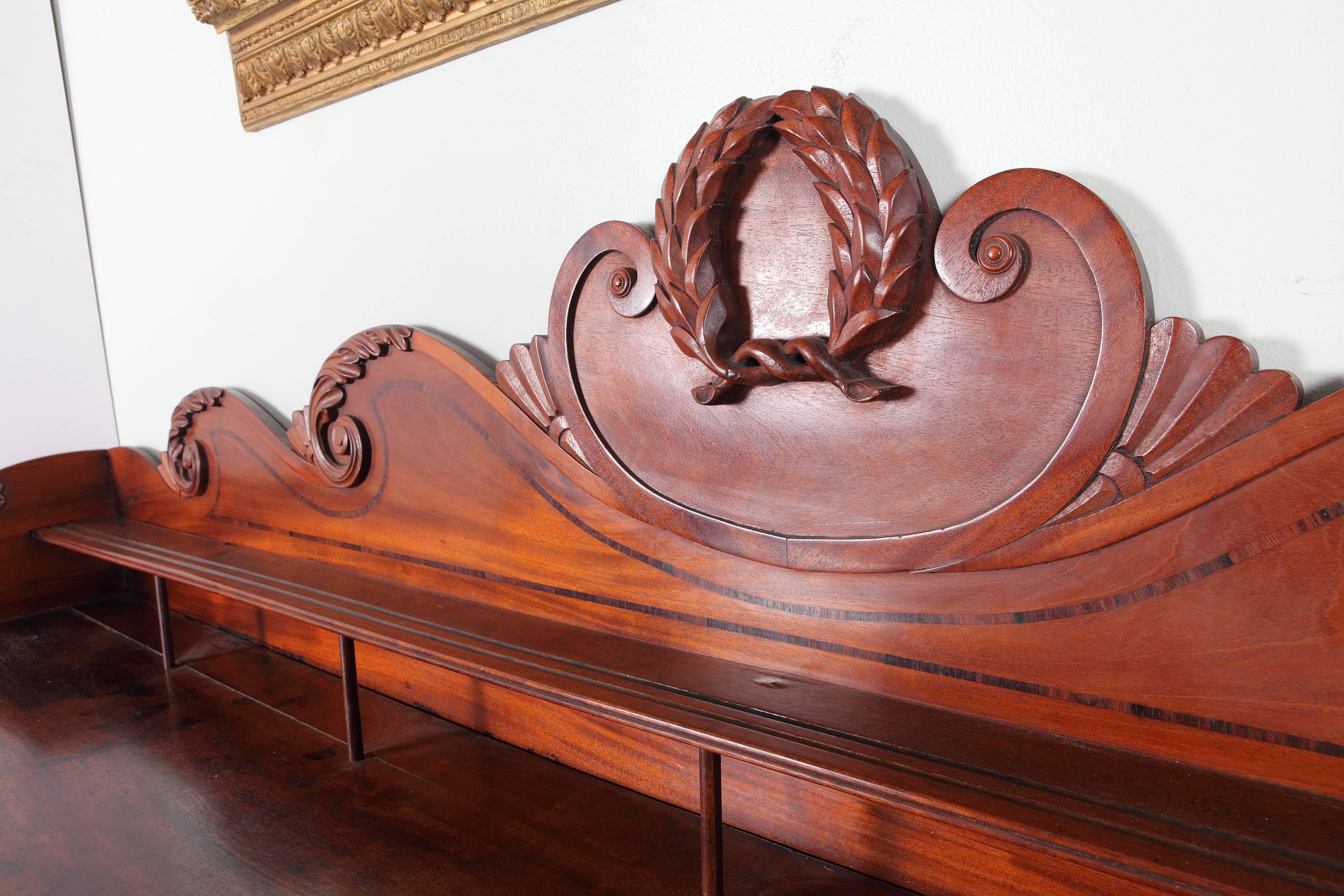Magnificent large-scale mid-19th century highly carved Irish mahogany sideboard.