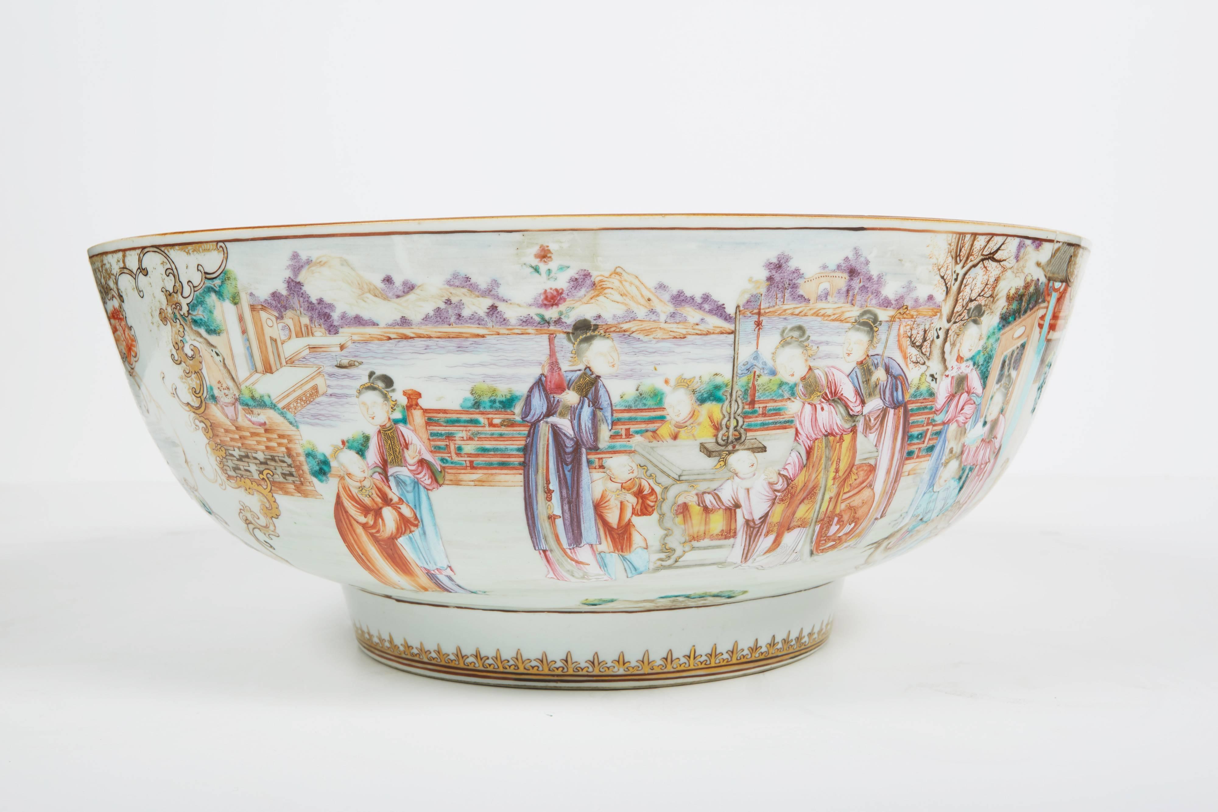 Large 18th century Chinese export punch bowl in the Rockefeller pattern (also known as Chinese Export Palace Ware). Elaborate gilt decoration with decorated larger reserves beautifully painted in a famille rose pallette showing Mandarin scenes and