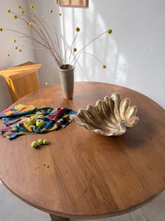 Large 1900s carved wood shell-shaped dish with gold patina