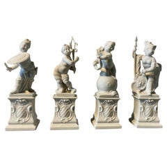 Set of four Nymphenburg blanc de chine putti.
