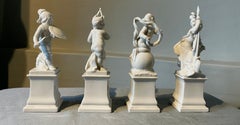 Set of four Nymphenburg blanc de chine putti.