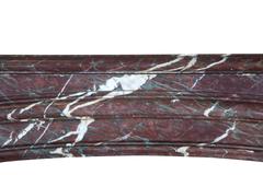 Autentica cornice francese per caminetto in marmo Rouge Griotte