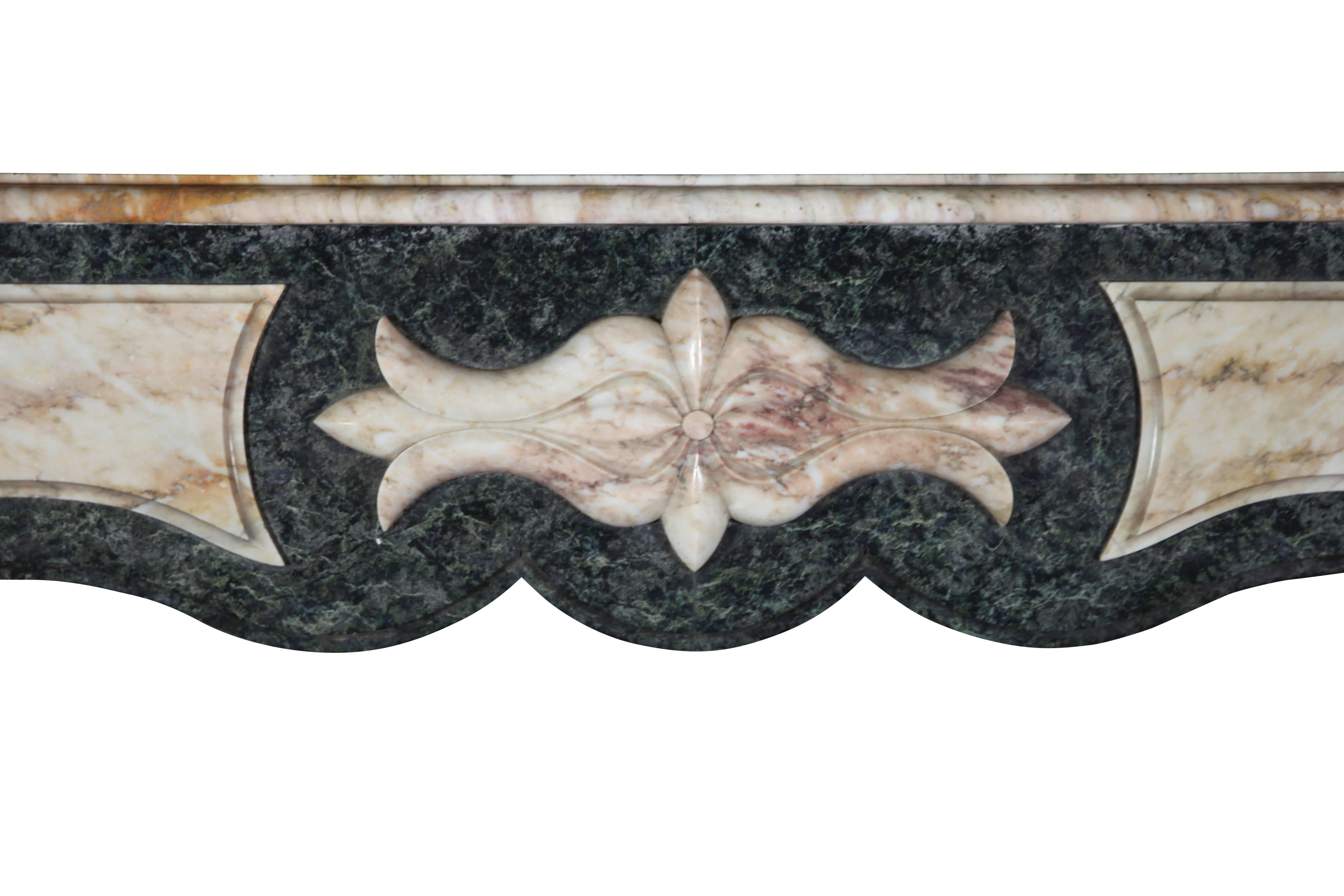 This is a very unique marble combination typically used in the inter war period.
The shelf is made in parefeuille.
Measures:
171 cm EW 67.32".
103 cm EH 40.55".
109 cm IW 42.91".
79 cm IH 31.10".
36 cm S 14.17".
    