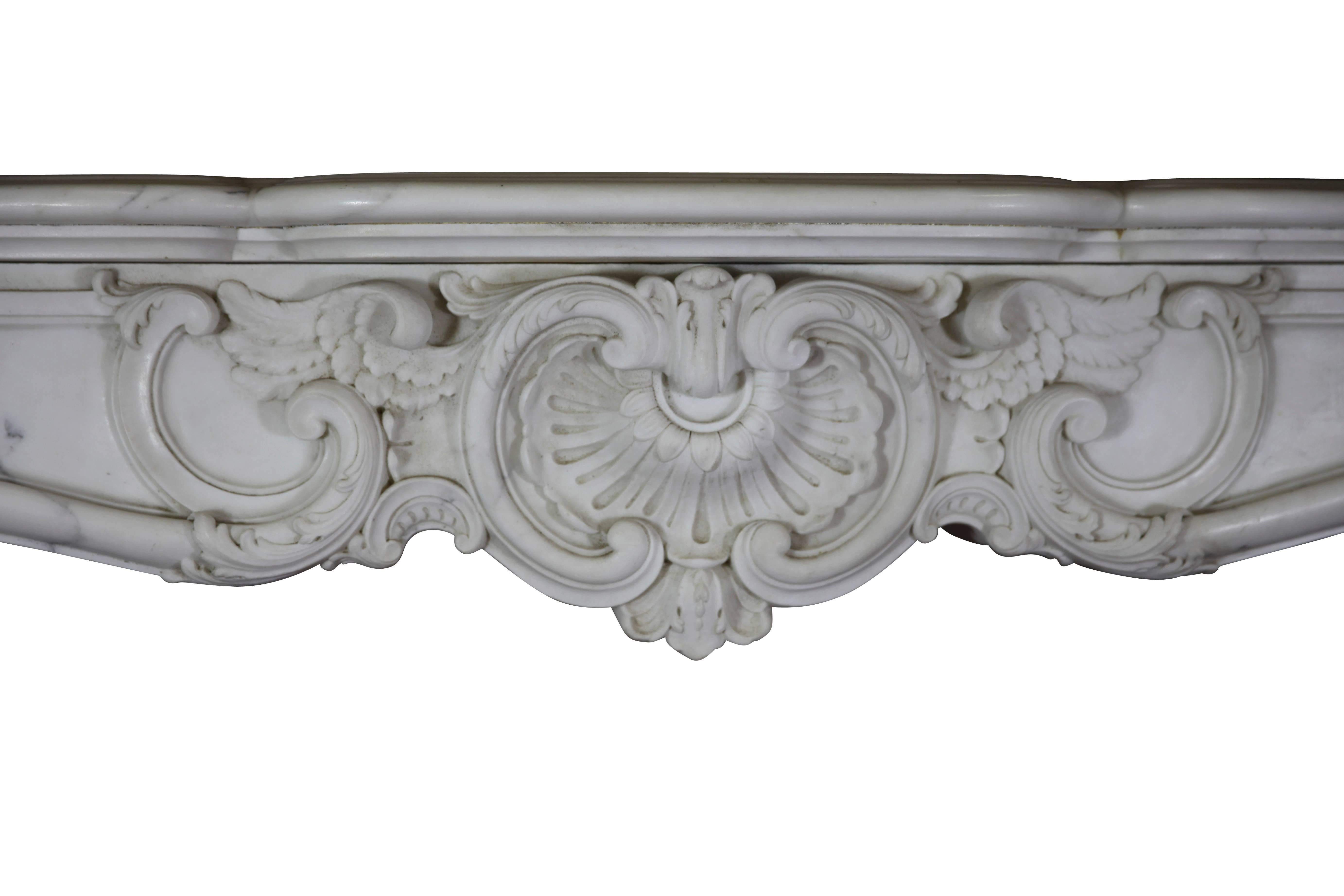 This is one of a kind fireplace surround in Carrara marble was made by special order for the Castle of Fontainebleau. The identical but in grey mantel was installed in the Castle of Fontainebleau. 
It was build in the Empire period. The typical