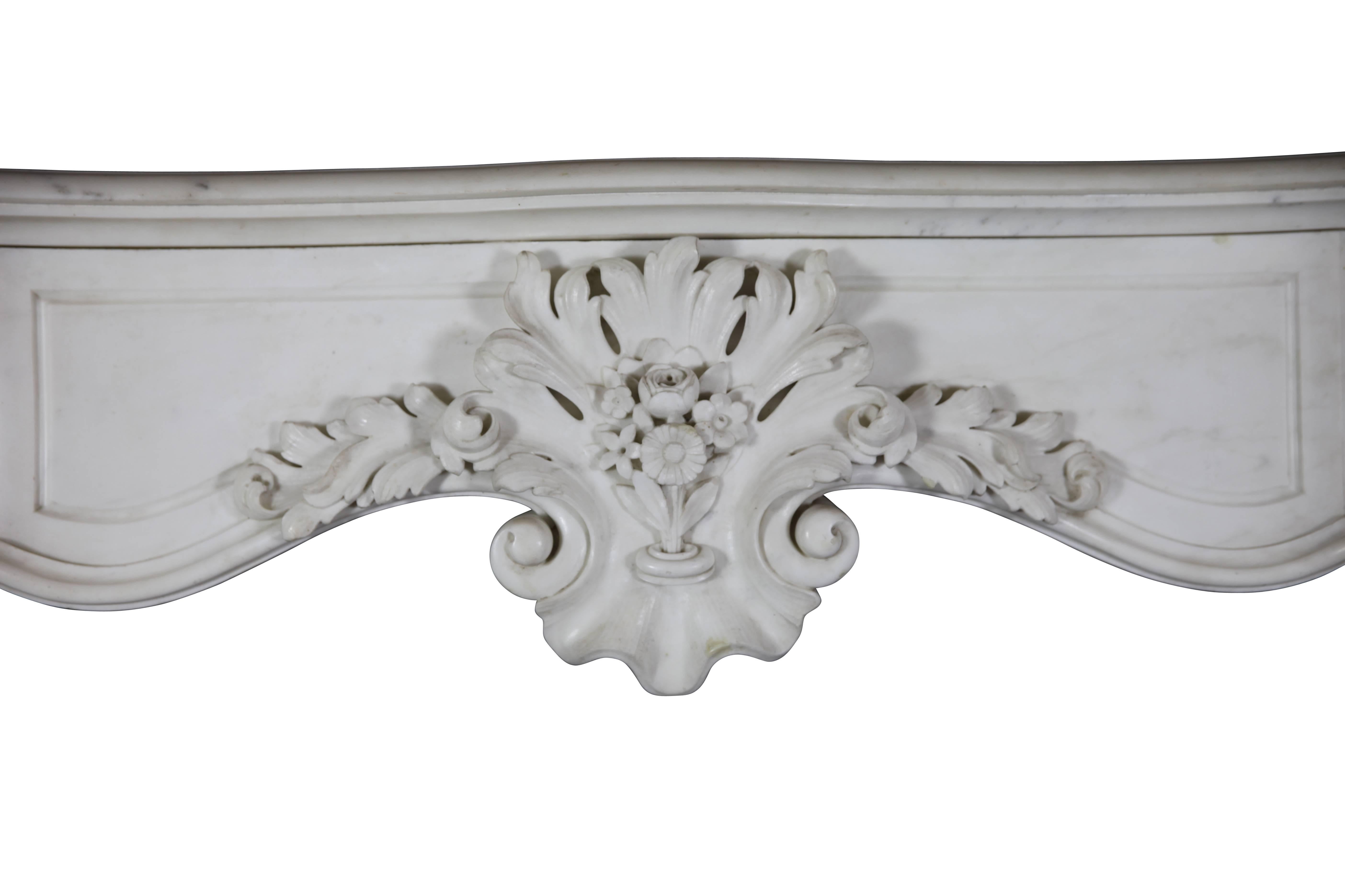 This is an phenomenal Rococo fireplace surround in white statuary marble. Very exceptional see the images. A real state of the art mantel in perfect condition.
Measures:
161 cm EW 63,39”.
110 cm EH 43,31”.
119 cm IW 46,85”.
90 cm IH 35,43”.
38