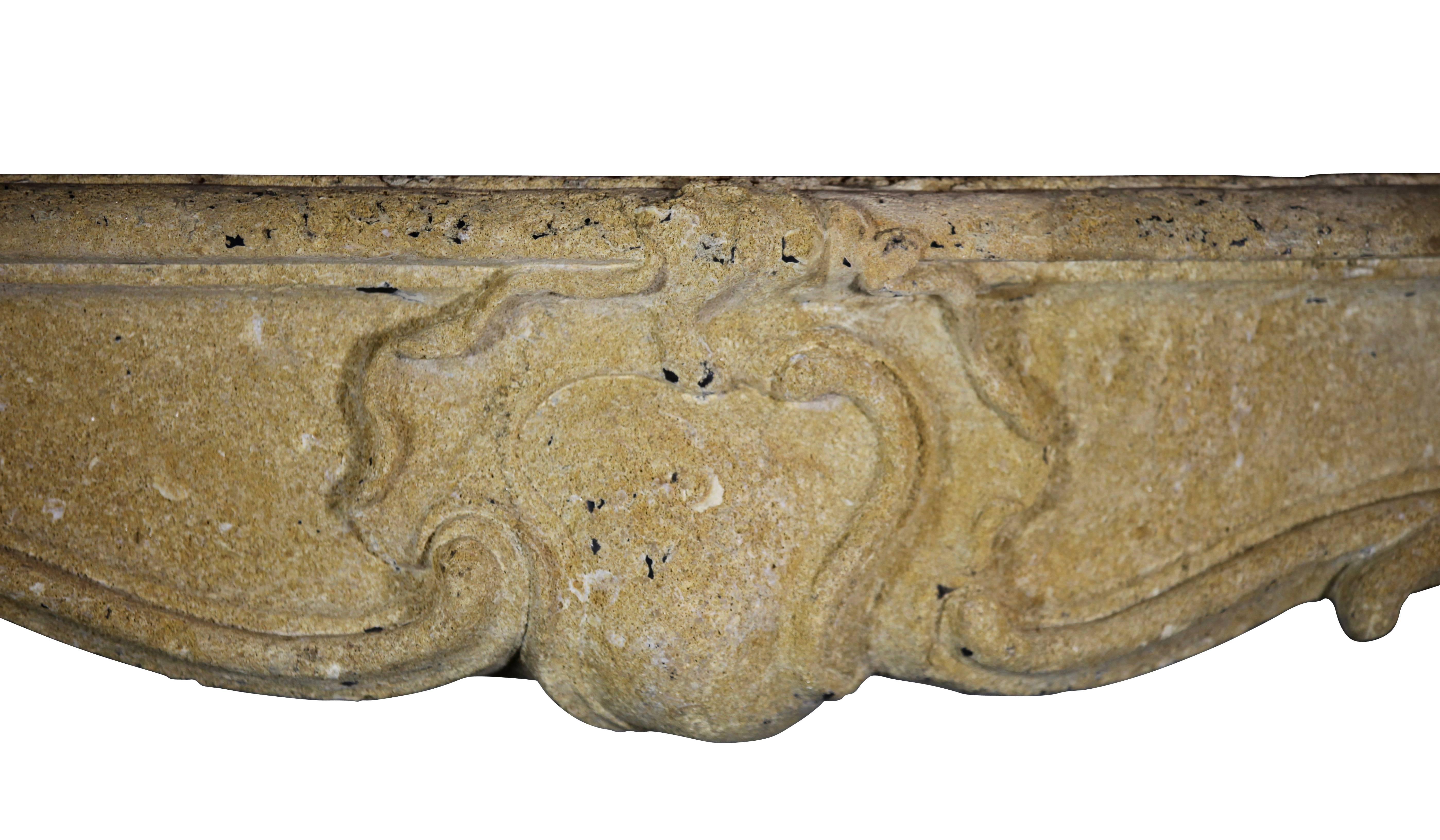 A museum quality petite original antique fireplace surround in Pierre d'or from the region of Rome with amazing remains of the original patina.
Measures:
138 cm EW 54.33".
103 cm EH 40.55".
102 cm IW 40.15".
83 cm IH
