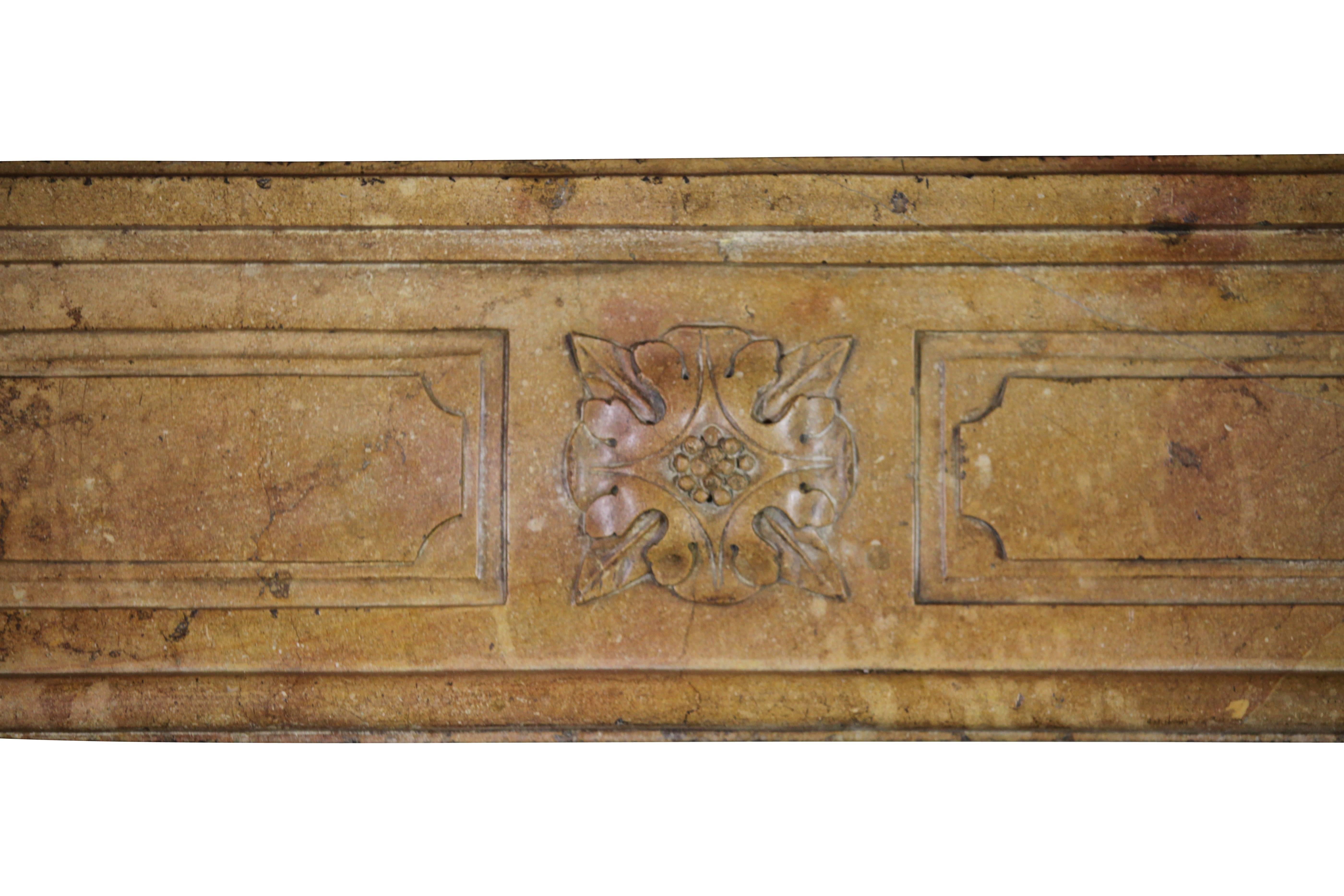 This one is a real treasure. The burgundy hard stone has been very nicely waxed. Like the French saying goes "dans son jus" Touching it brings you back in time. It is a Burgundy hard stone and this fireplace surround has been built in the