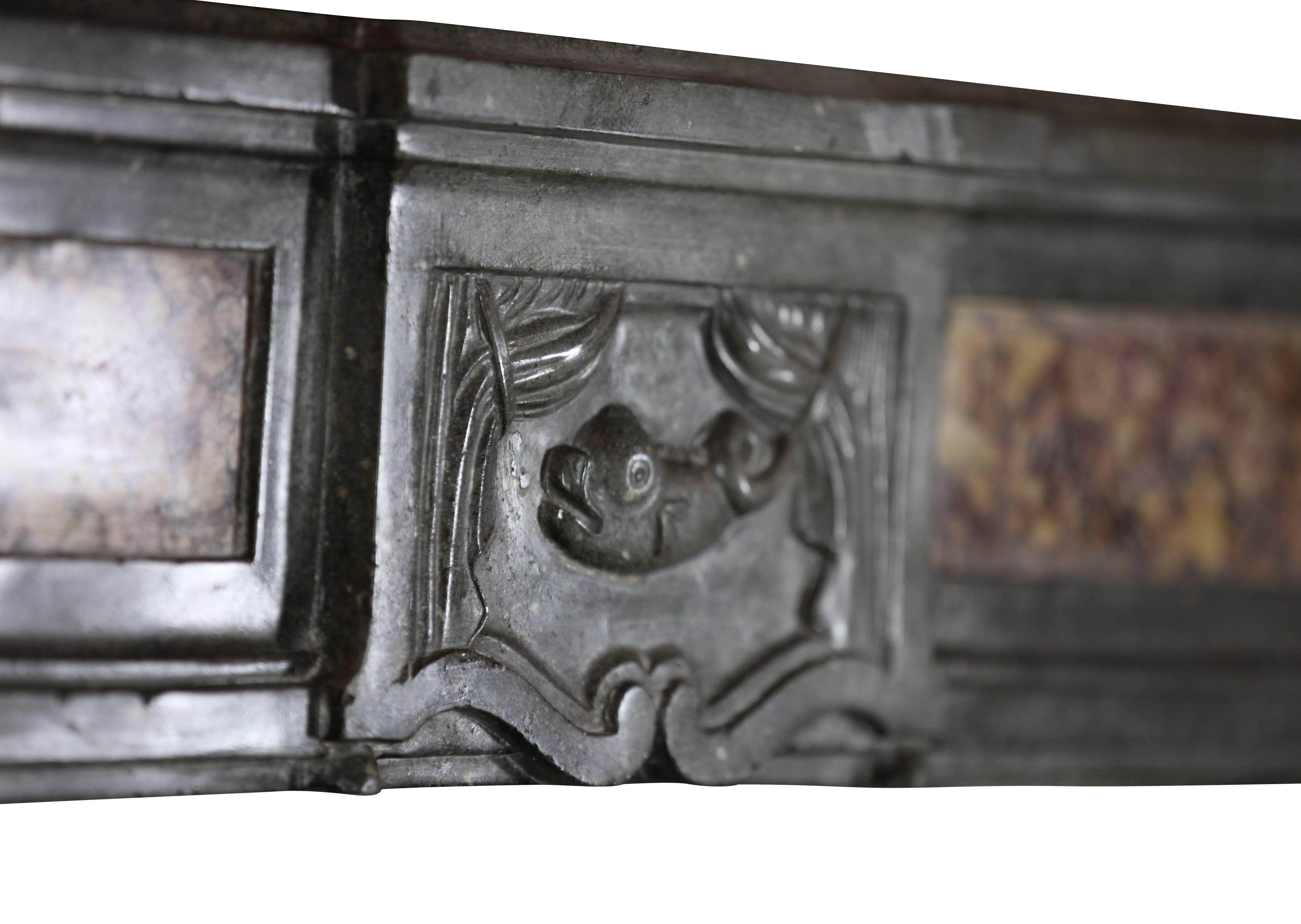 French Bicolor Antique Stone And Marble Fireplace Surround With Dolphin From Italiy For Sale
