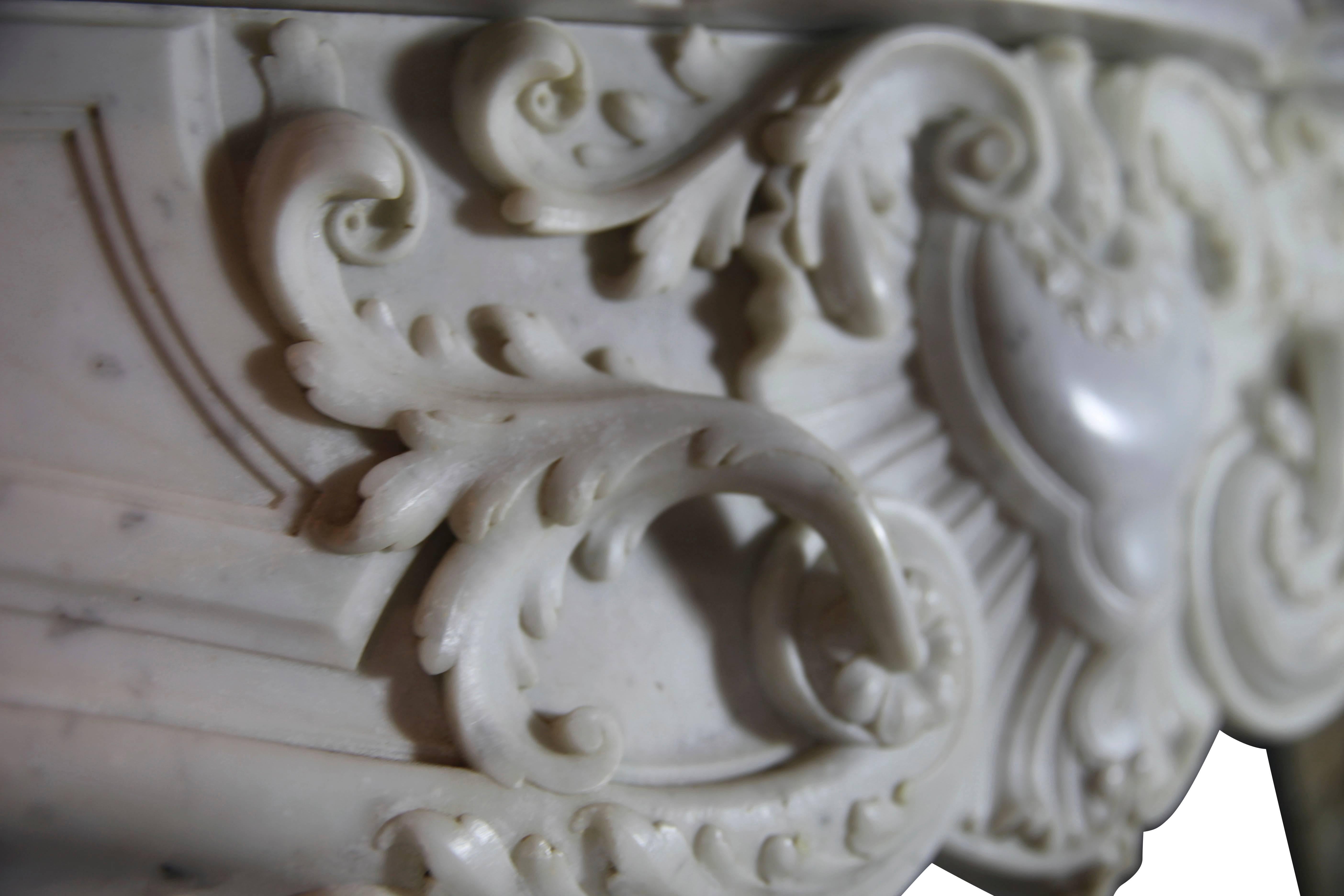 Hand-Carved French Grand Interior Antique Fireplace Surround in Carrara White Marble For Sale