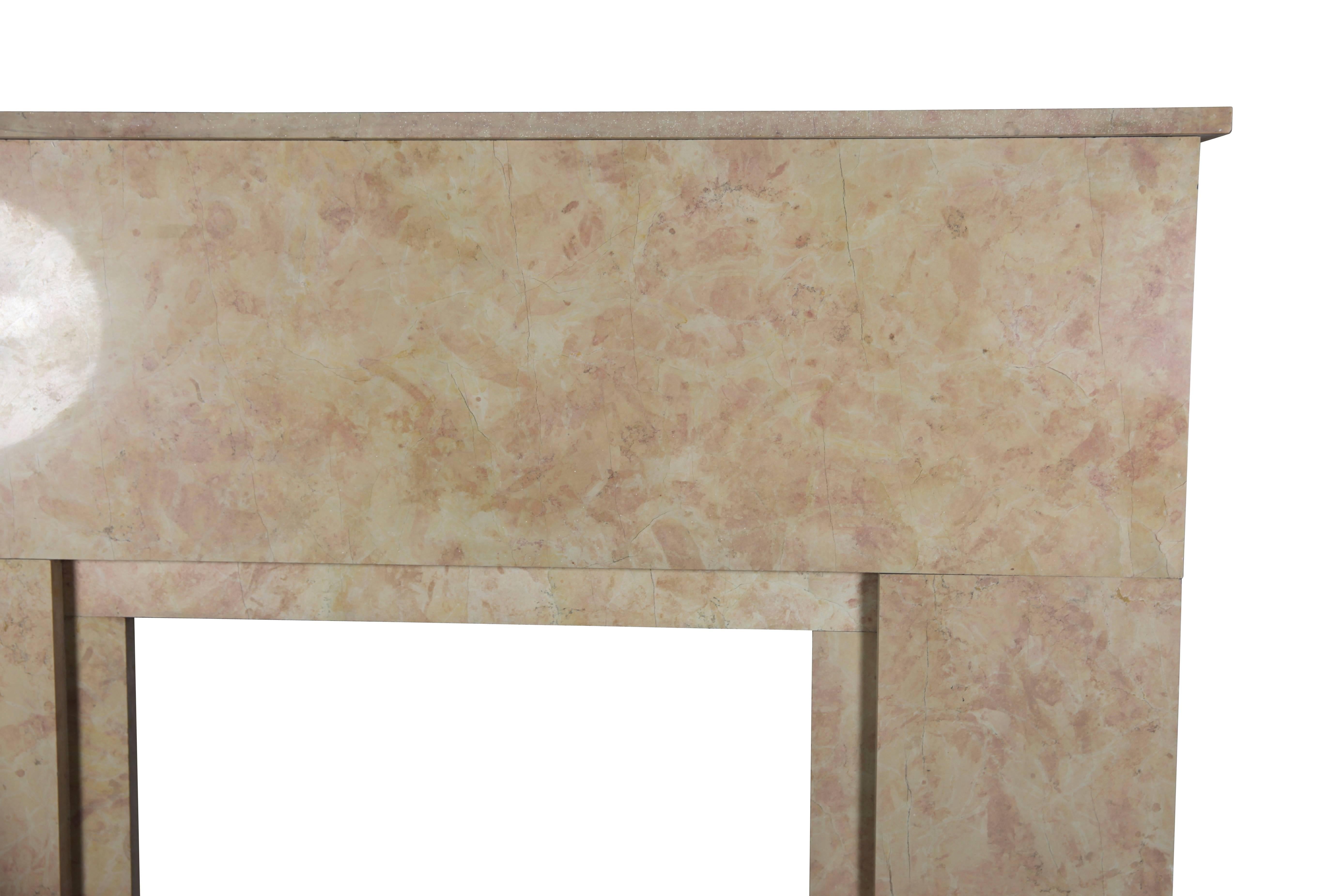 This original Art Deco period fireplace surround from the Burgundy region is built in the exquisite rose liseron marble from the French Burgundy region. Many historic landmarks carry this marble.

Measures;
113 cm EW 44.49