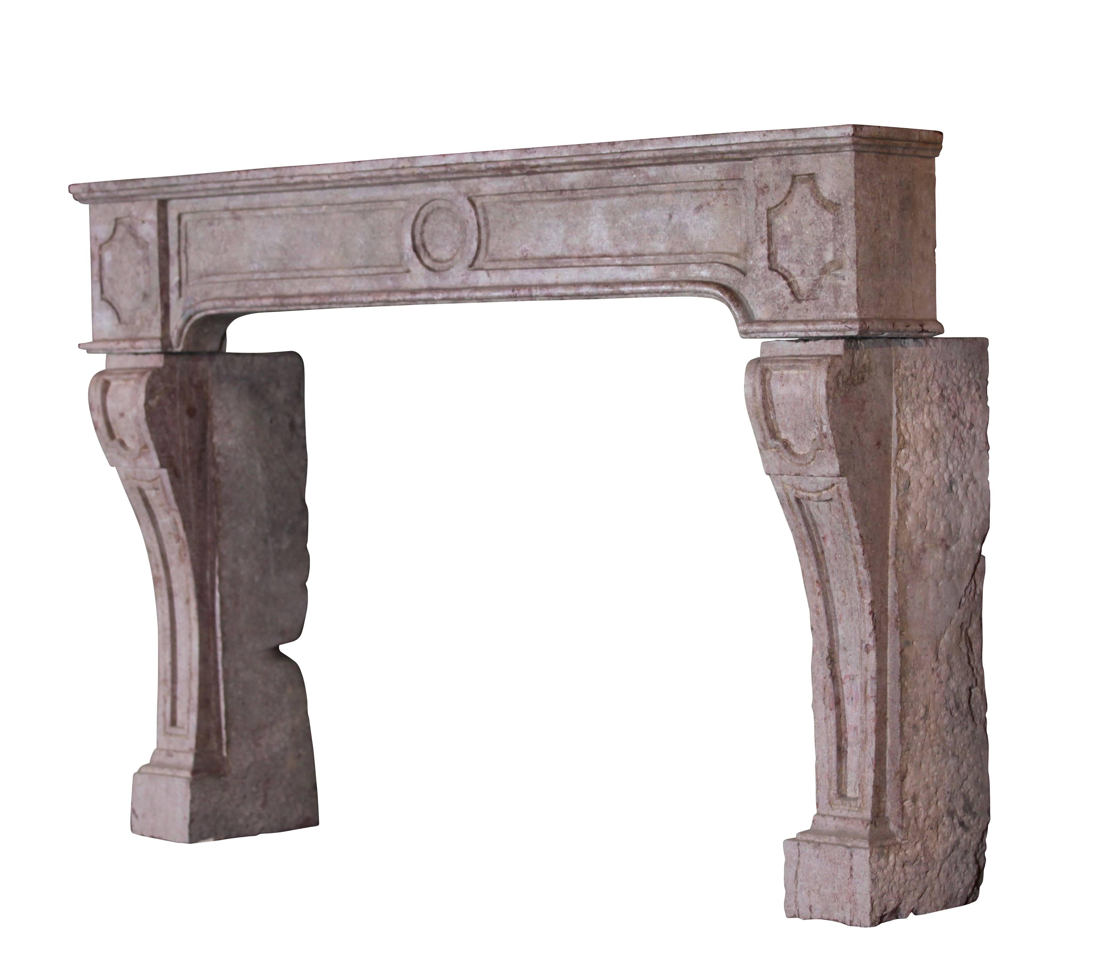 This antique fireplace surround in Burgundy reddish marble stone has a naive rustic touch. Waxing can make this piece having a richer look, more to porfire. The legs are very elegant.

Measures:
174 cm EW 68,50",
118 cm EH 46,45",
133