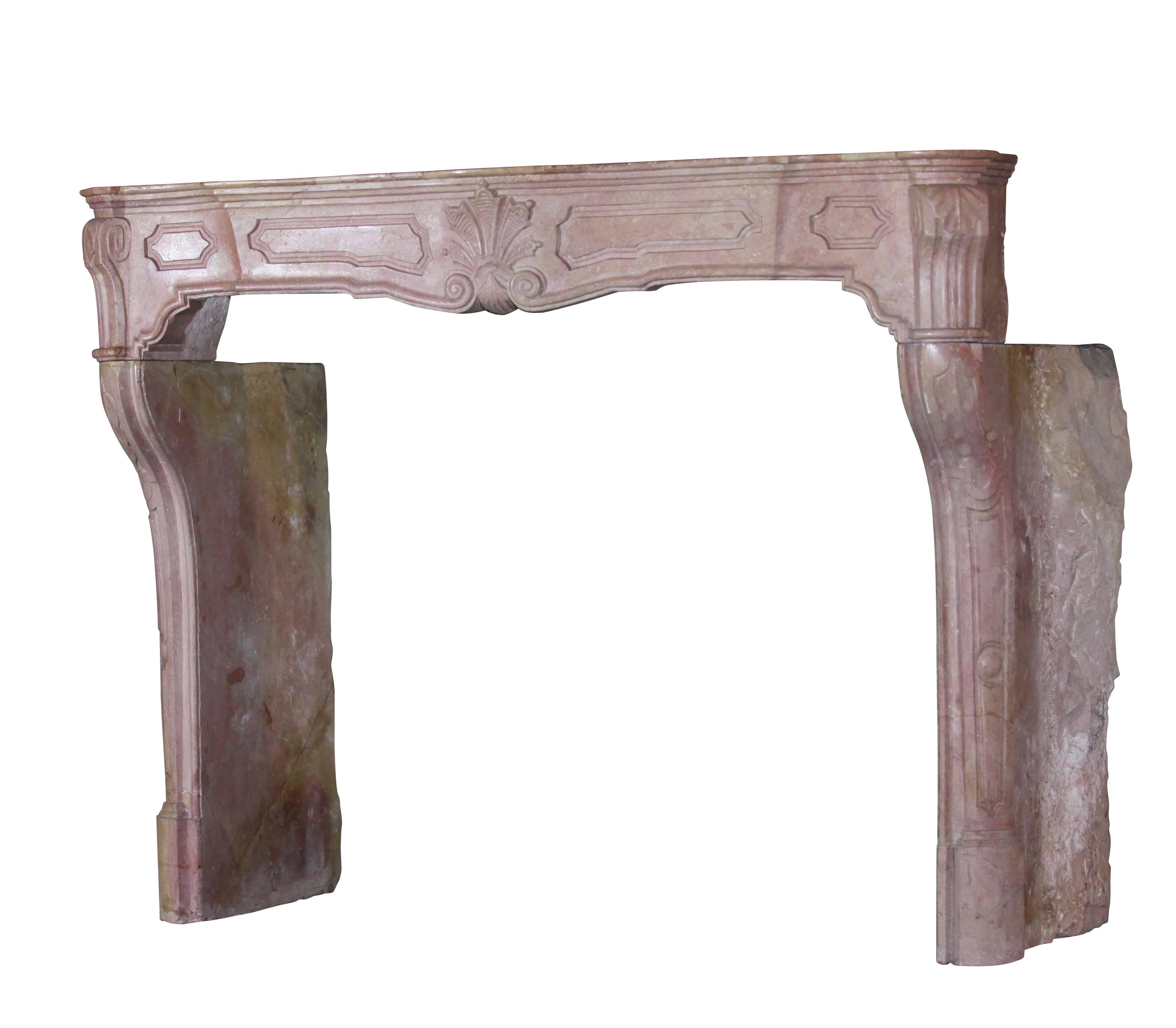 This one of a kind antique fireplace surround was made out of a burgundy hard stone and reflects an Italian style.

Measures;
151 cm EW 59,45