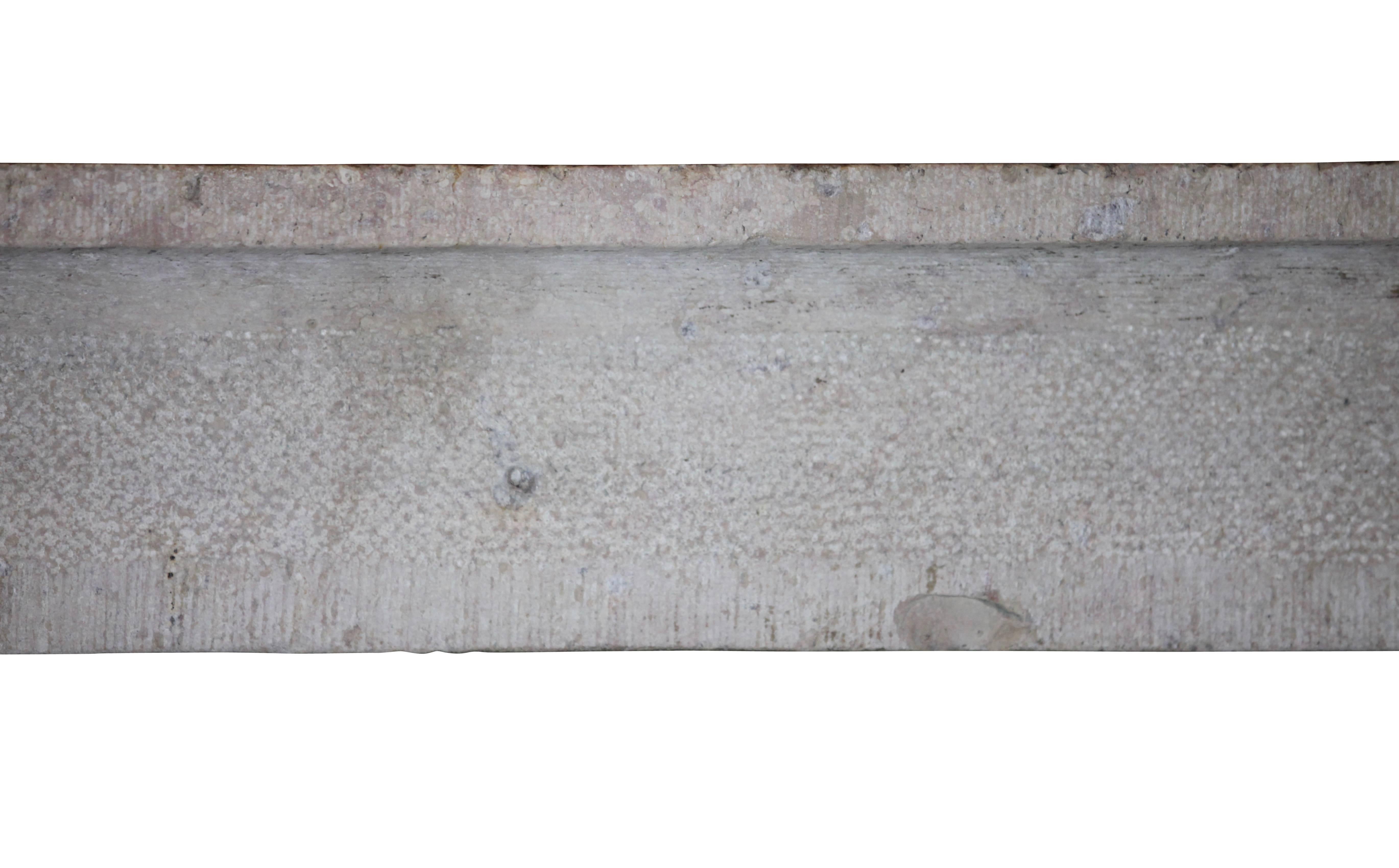 High country and rustic marble stone fireplace surround from the burgundy region. A limestone teint.

Measures:
157 cm EW 61,81",
137 cm EH 53,93",
131 cm IW 51,57",
123 cm IH 48,42",
28 cm S 11,02",
58 cm L