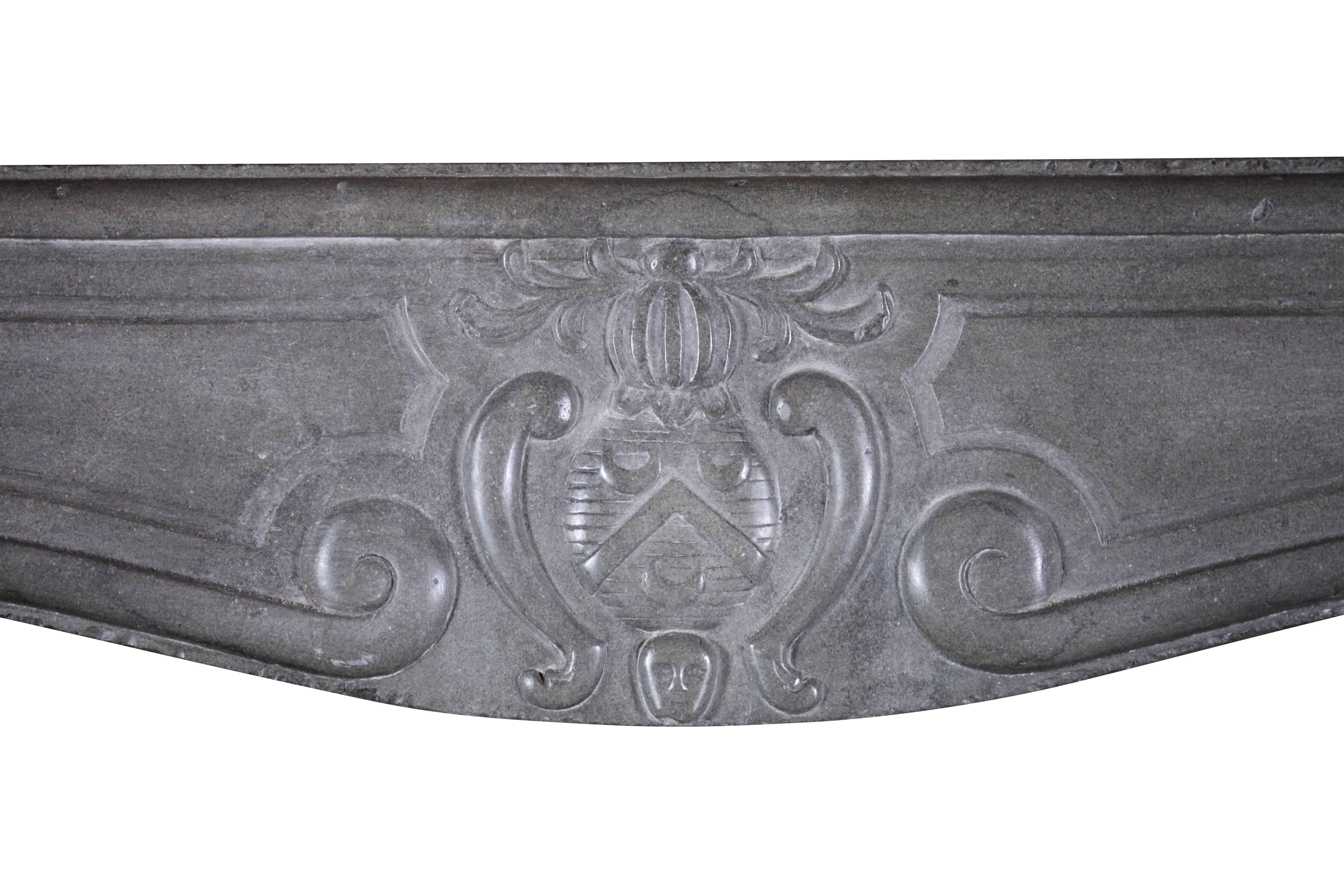 Museum quality very original antique fireplace surround in burgundy bicolor marble stone with an exceptional center. The center is the armory of an important Nobelli family.
The legs are round. This is without any doubt a once in a lifetime
