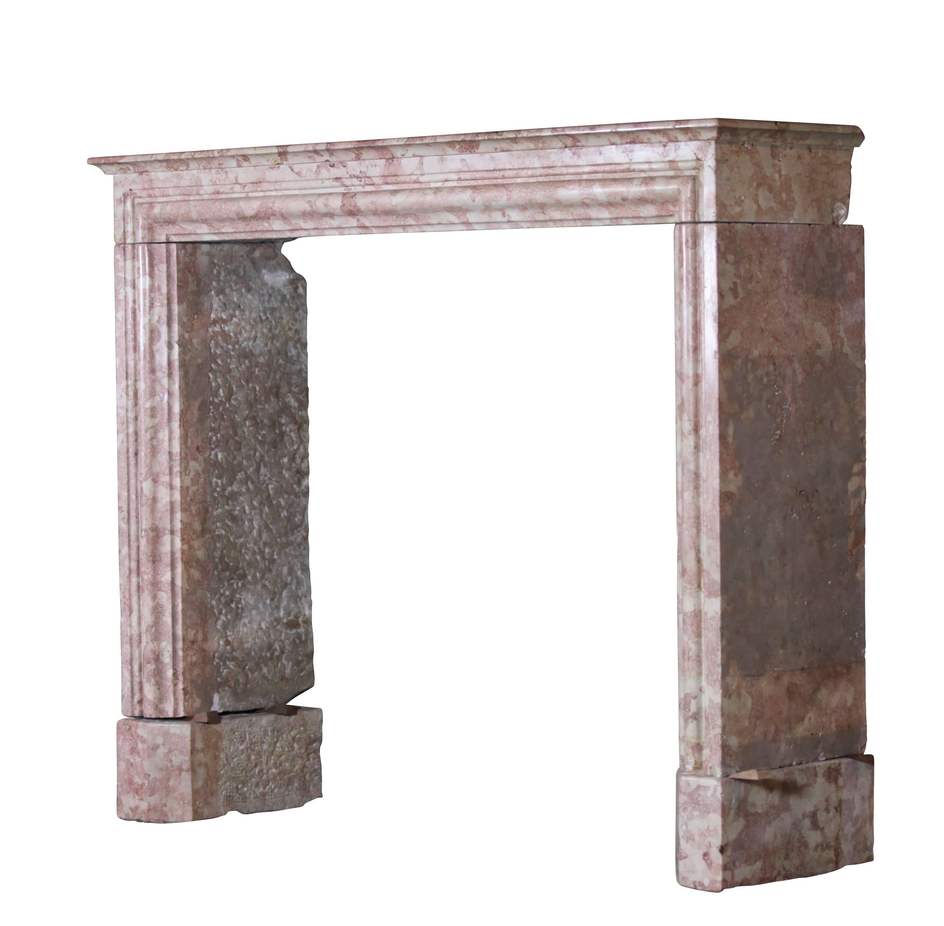 This is an antique fireplace surround from the south of the Burgundy region.
The marble was used in lots of historical landmarks.
Measures:
121 cm EW 47.63 Inch
100 cm EH 39.37 Inch
96 cm IW 37.79 Inch
87 cm IH 34.25 Inch
29 cm S 11.41 Inch
232 kg.
 