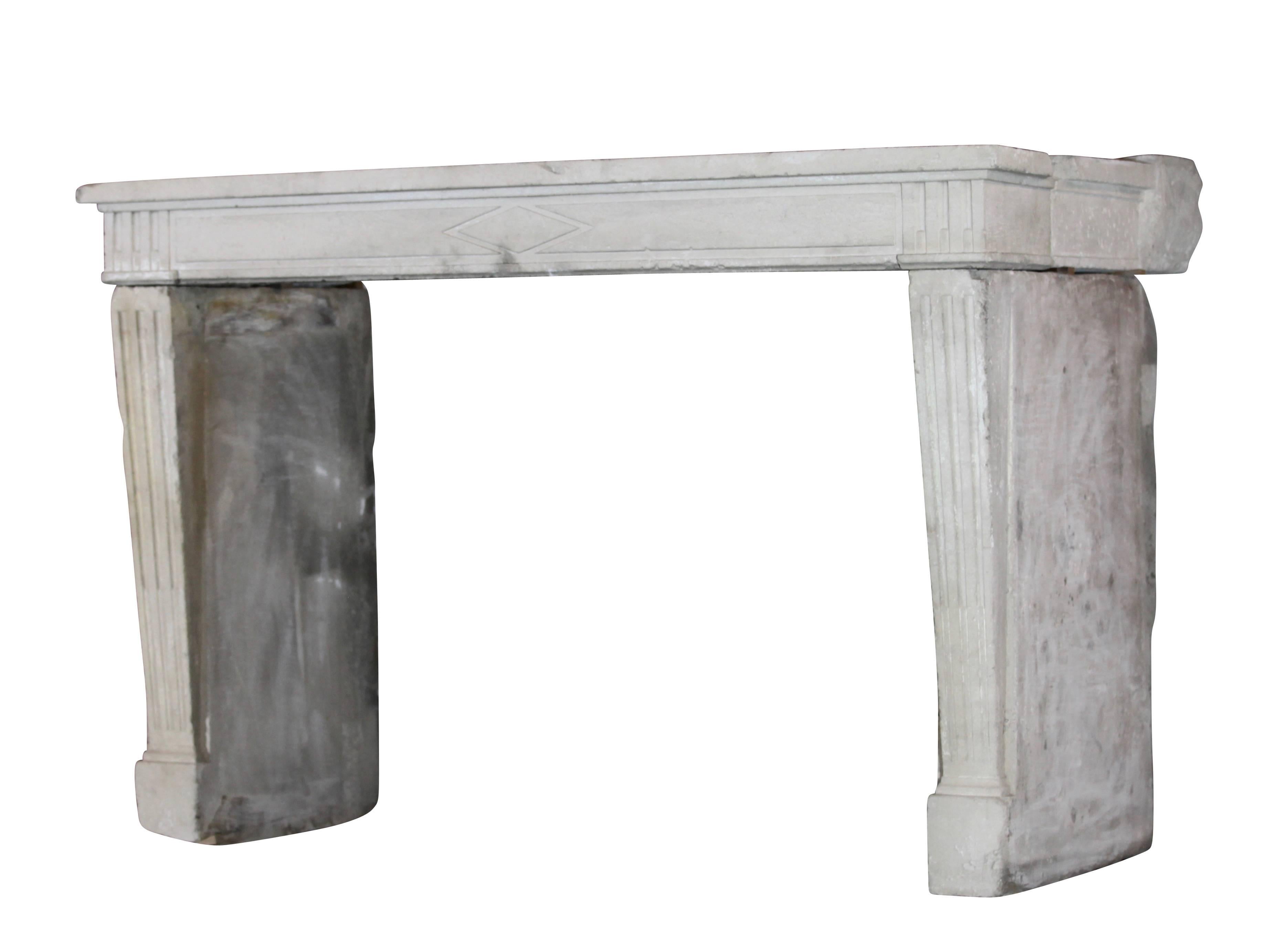 This country limestone surround has straight legs and has two side pieces. The leg are very deep. It can eventually been built around a smaller upper mantel.
Measures:
179 cm EW 70.47",
150 cm EW+ 59.05",
121 cm EH 47.63",
142 cm