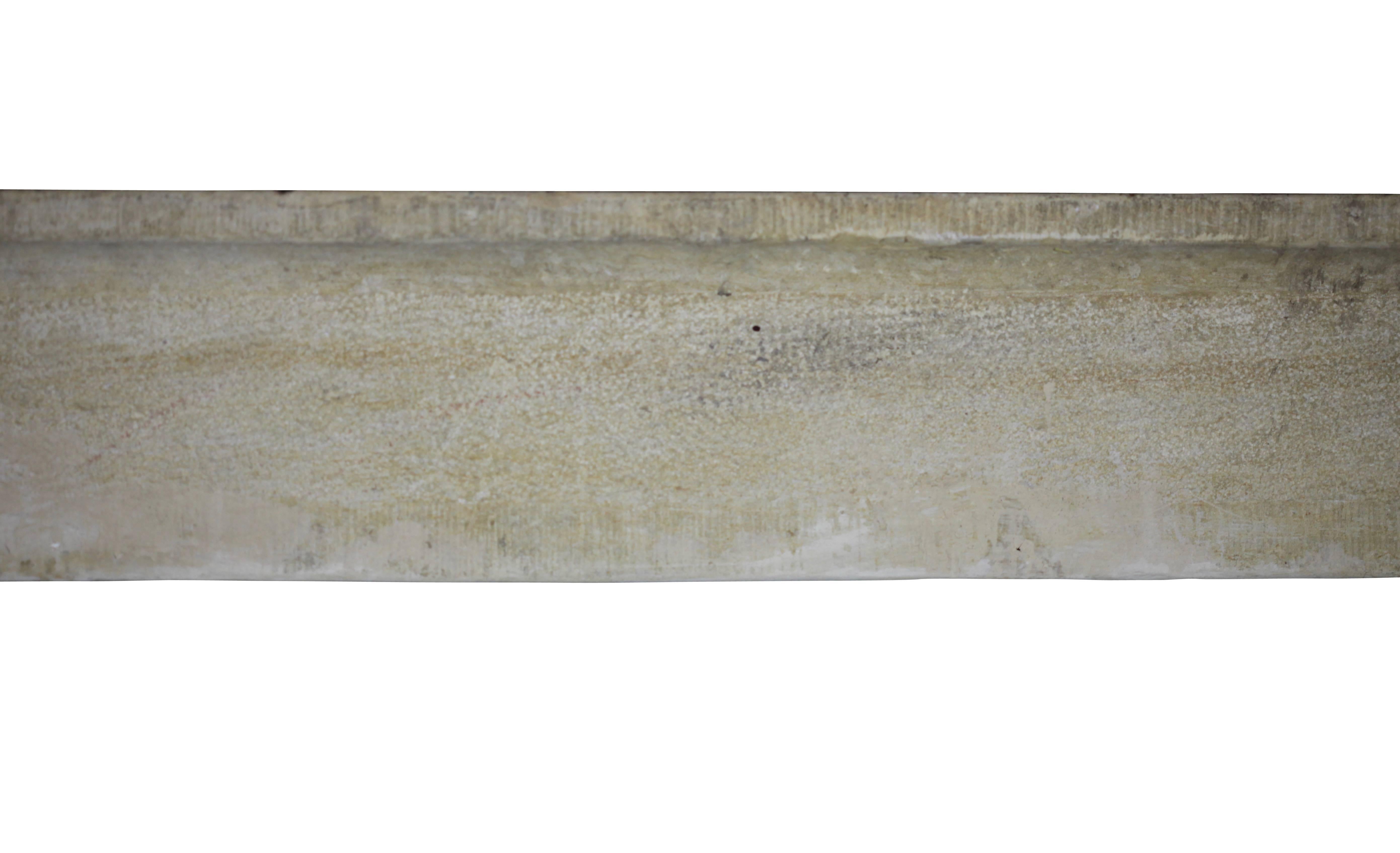 Rustic fireplace surround tailler and boucharder in limestone with the looks of a hard stone. A real country style mantel.

Measures:
136 cm EW 53.54",
103 cm EH 40.55",
111 cm IW 43.70",
90 cm IH 35.43",
25 cm S