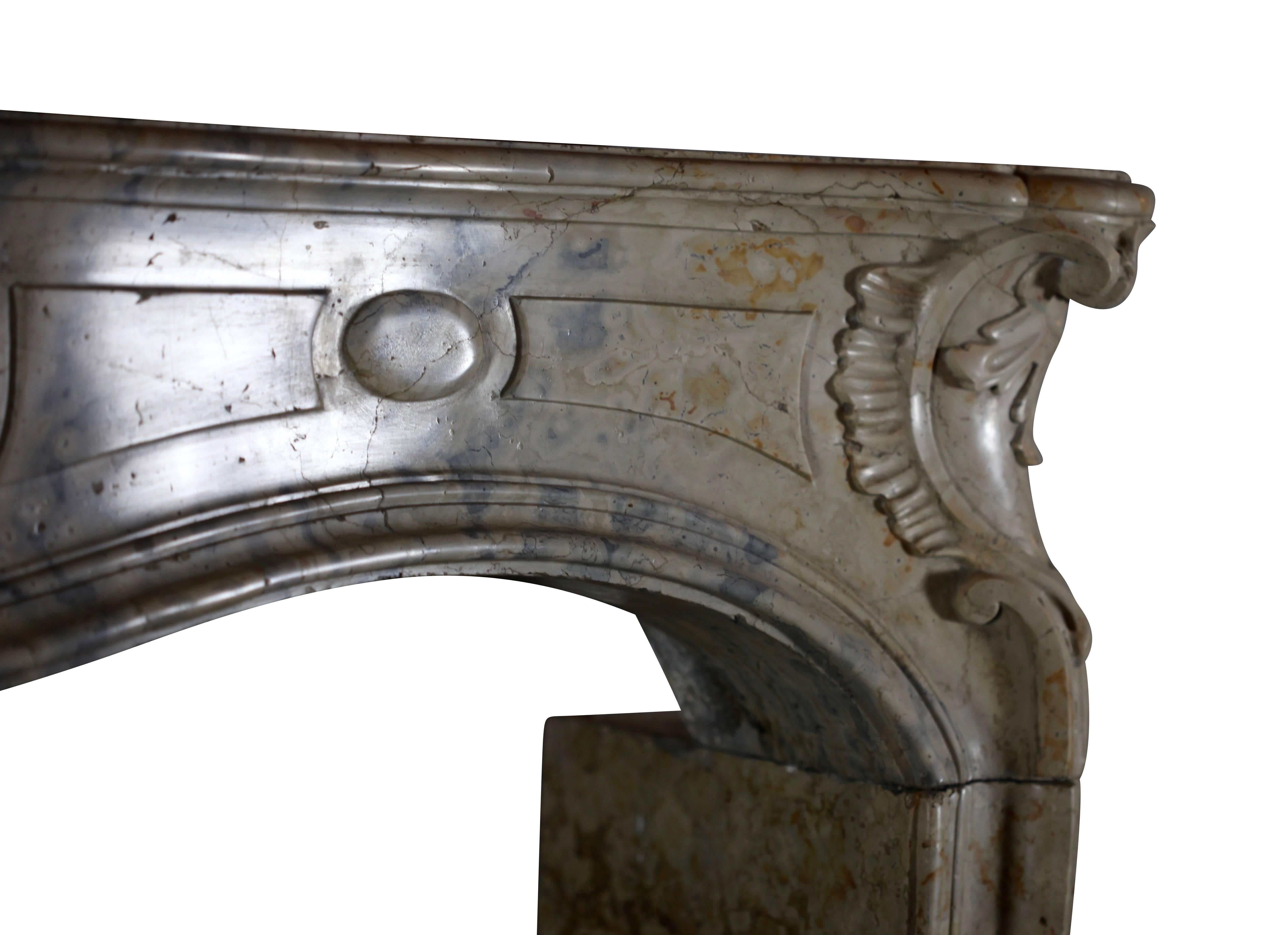 Carved Timeless Cosmopolitan Classic French Antique Fireplace Mantle For Sale