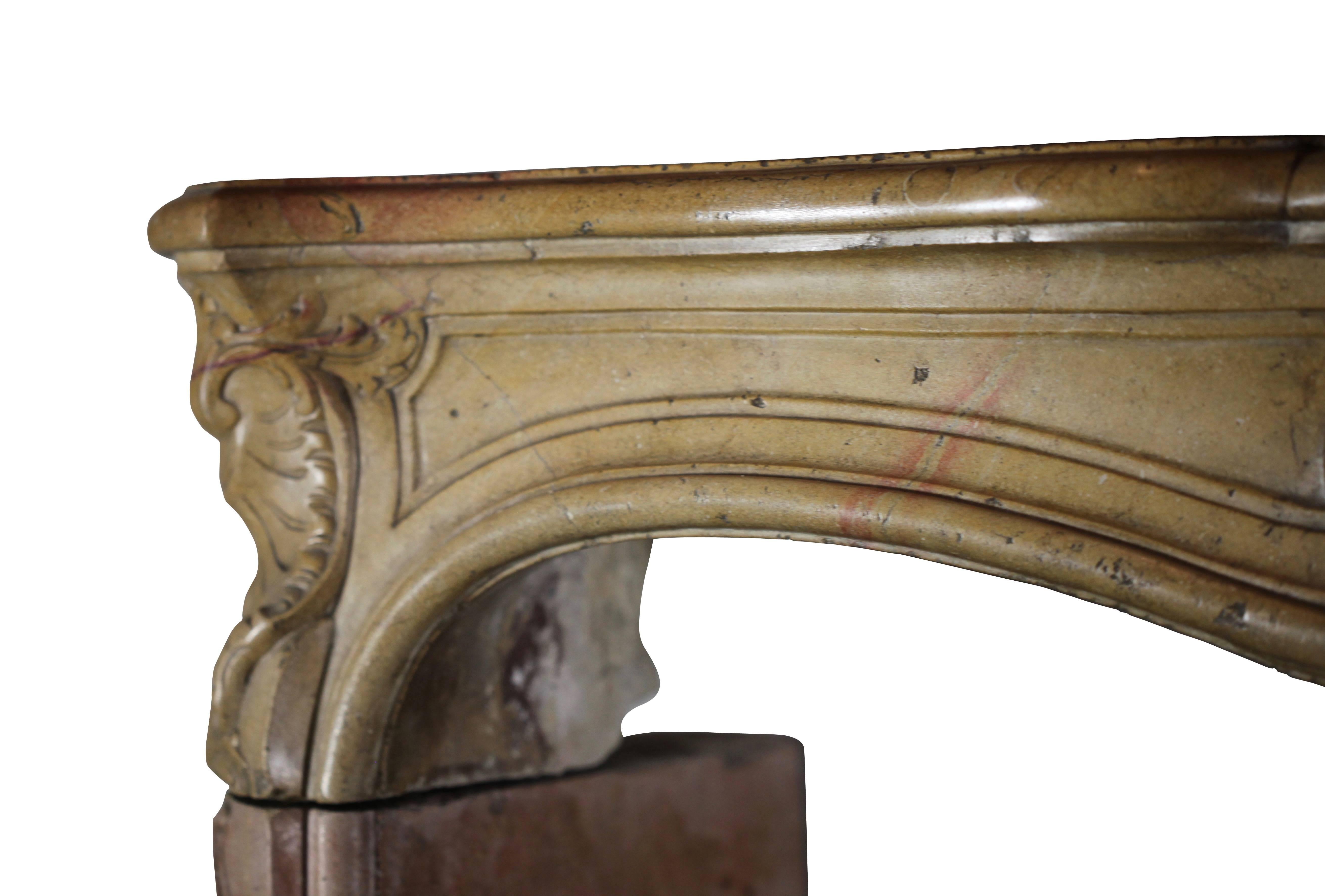Carved 18th Century Antique Fireplace Mantel in Burgundy Bicolor Hard Stone For Sale