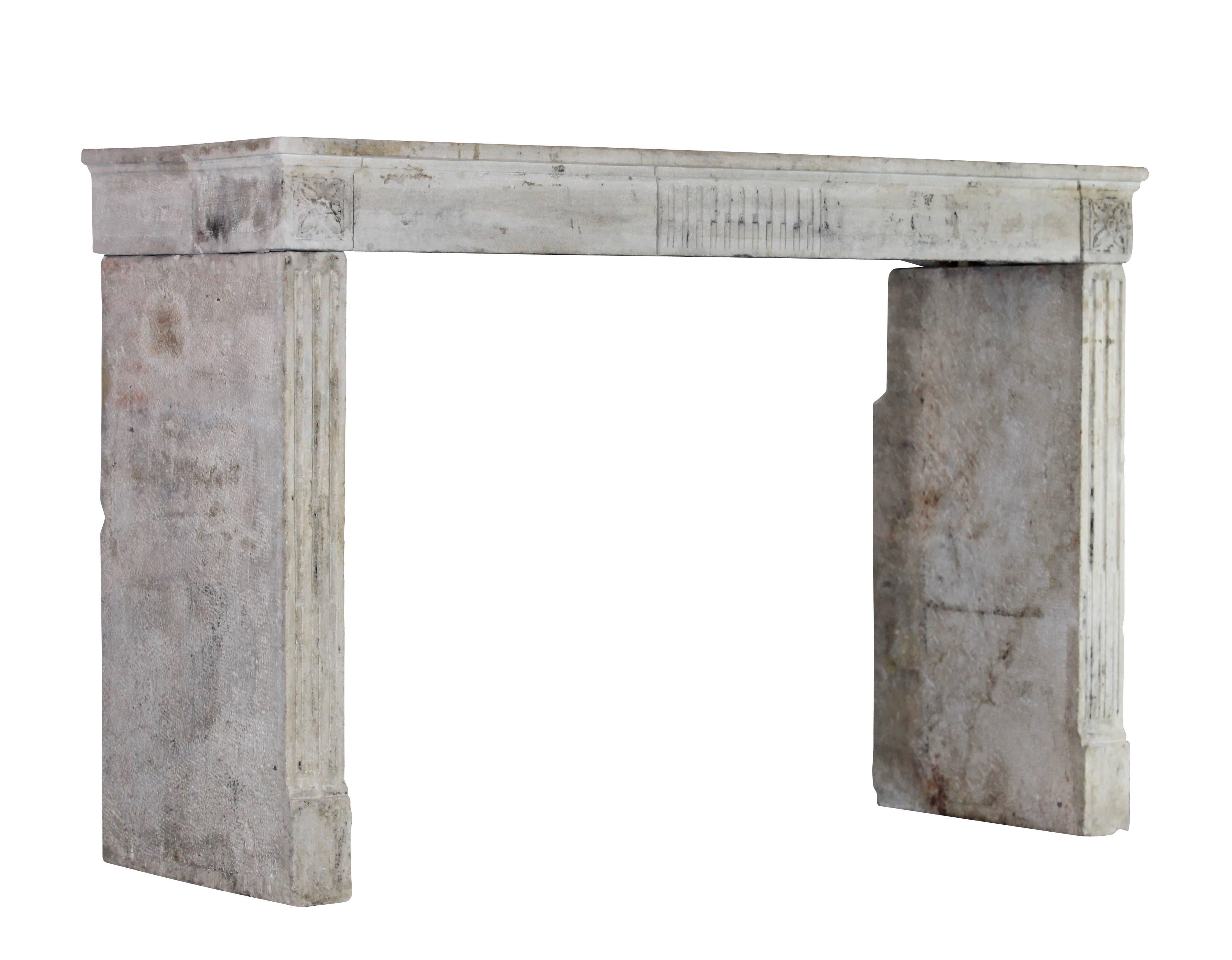 This very nice French country limestone fireplace surround carries still some original patina. The mantel has deep legs with deep retours. This is a typical fine LXVI period mantel.
18th century.
Measures:
178 cm EW 70.08