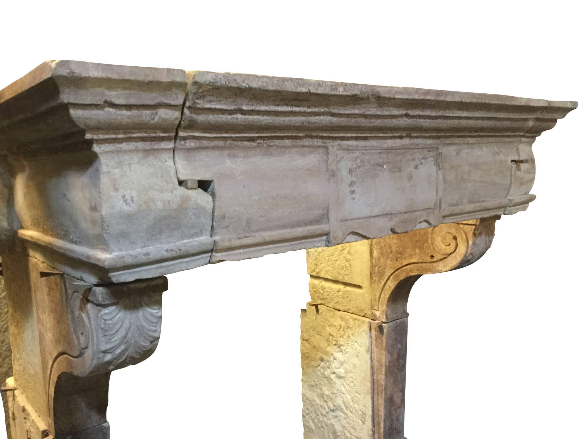 16th century, one of a kind original limestone fireplace surround with remains of the original patina. The sizes, petite, for the Renaiscance period makes this one even more interesting and easy fit in different room sizes. a real state of the art
