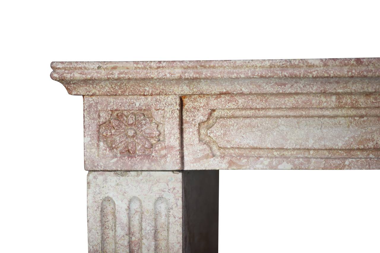The fronton is one solid piece of burgundy hard stone. This is a beautiful original petite fireplace surround in a Pink hard stone/marble. Perfect for a small classic room.
Measures:
120 cm EW 47.24