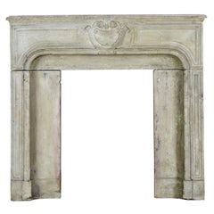 18th Century Small French Country Limestone Antique Fireplace Surround