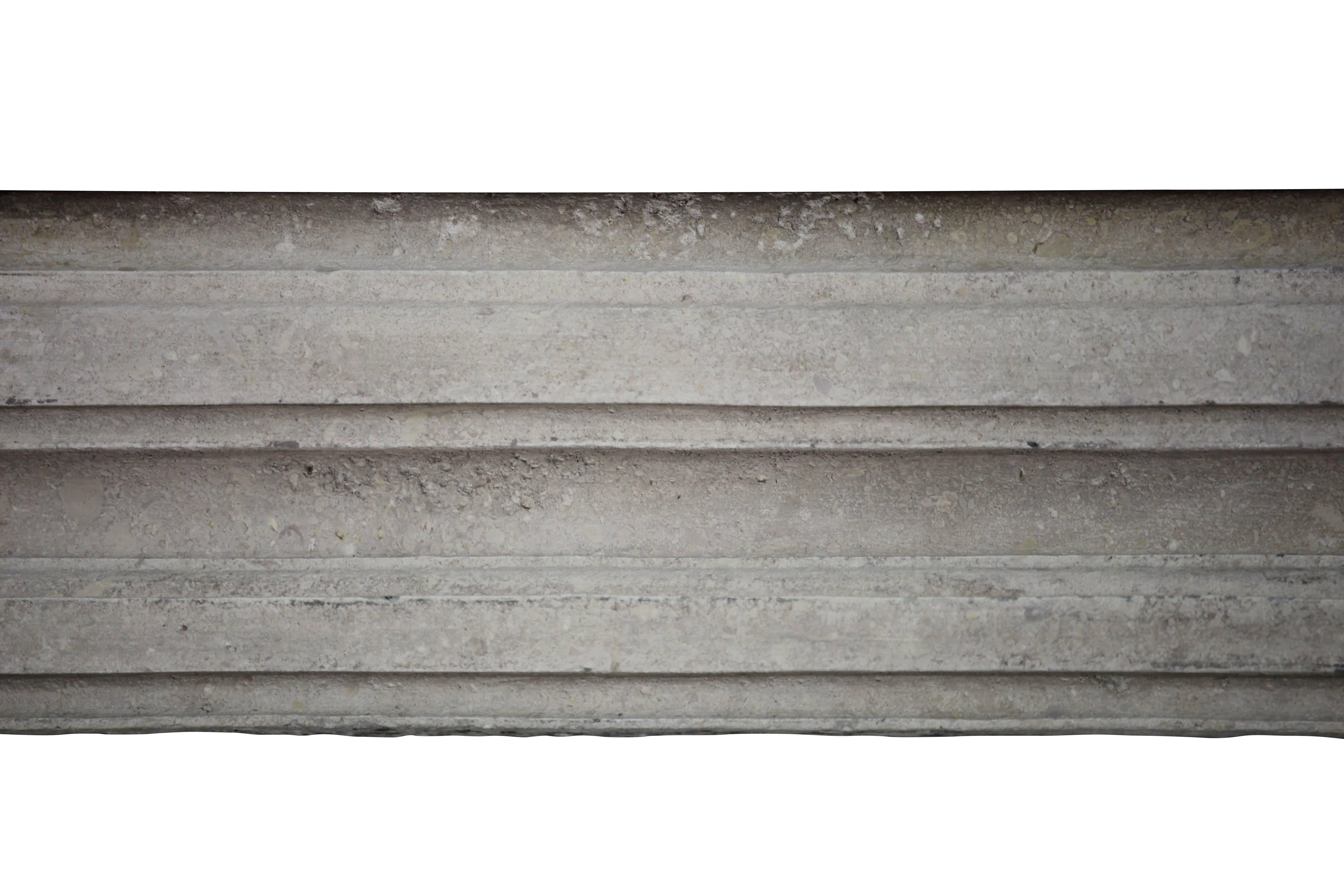 This limestone French country mantel has a diamond point detail on both sides of its front. A little remains of the original patina is an extra however can be removed. The limestone is also from the harder kind and when waxed will reflect light of