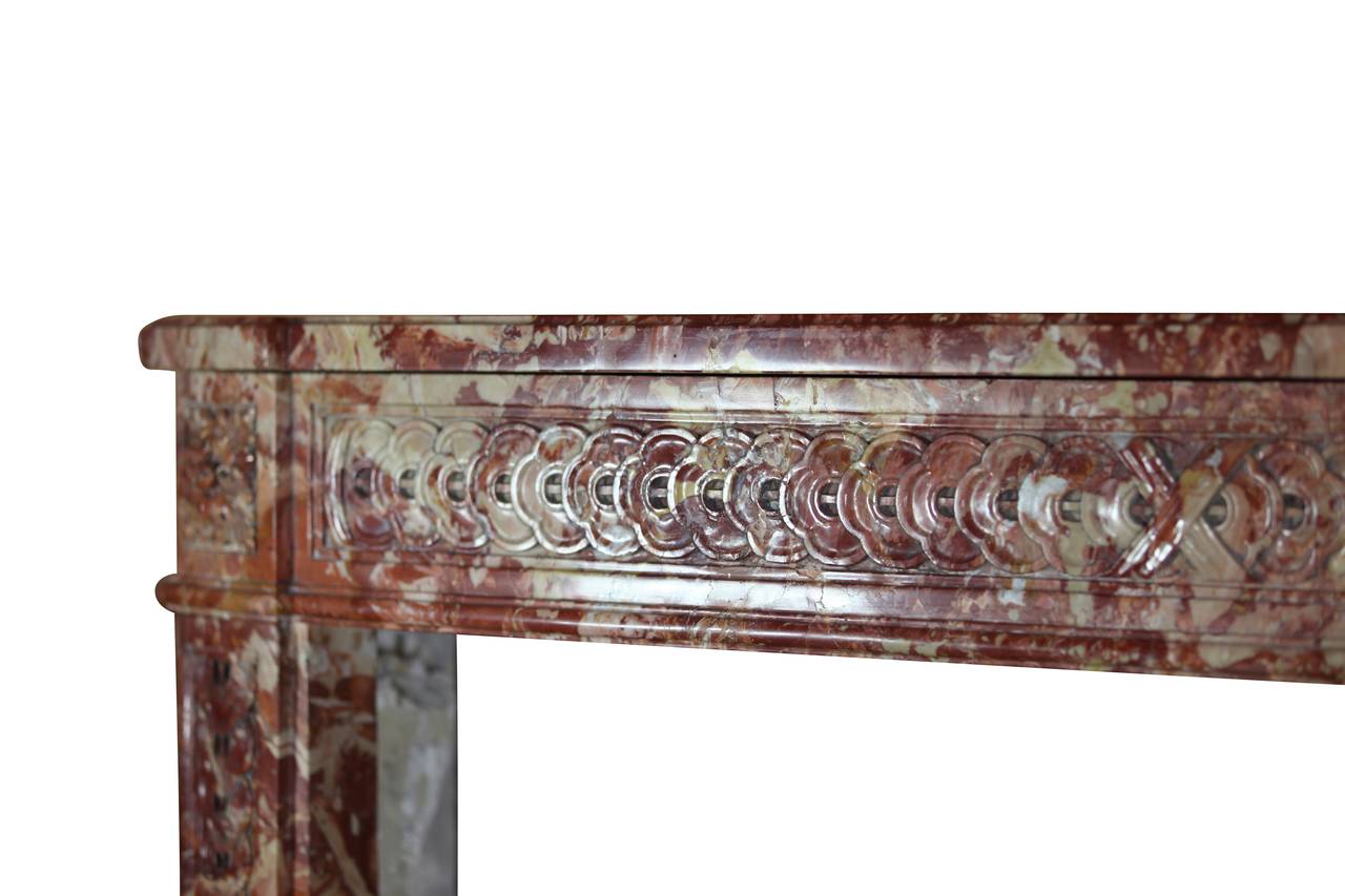 Polished 18th Century Fine French Antique Fireplace in Opulent Marble For Sale