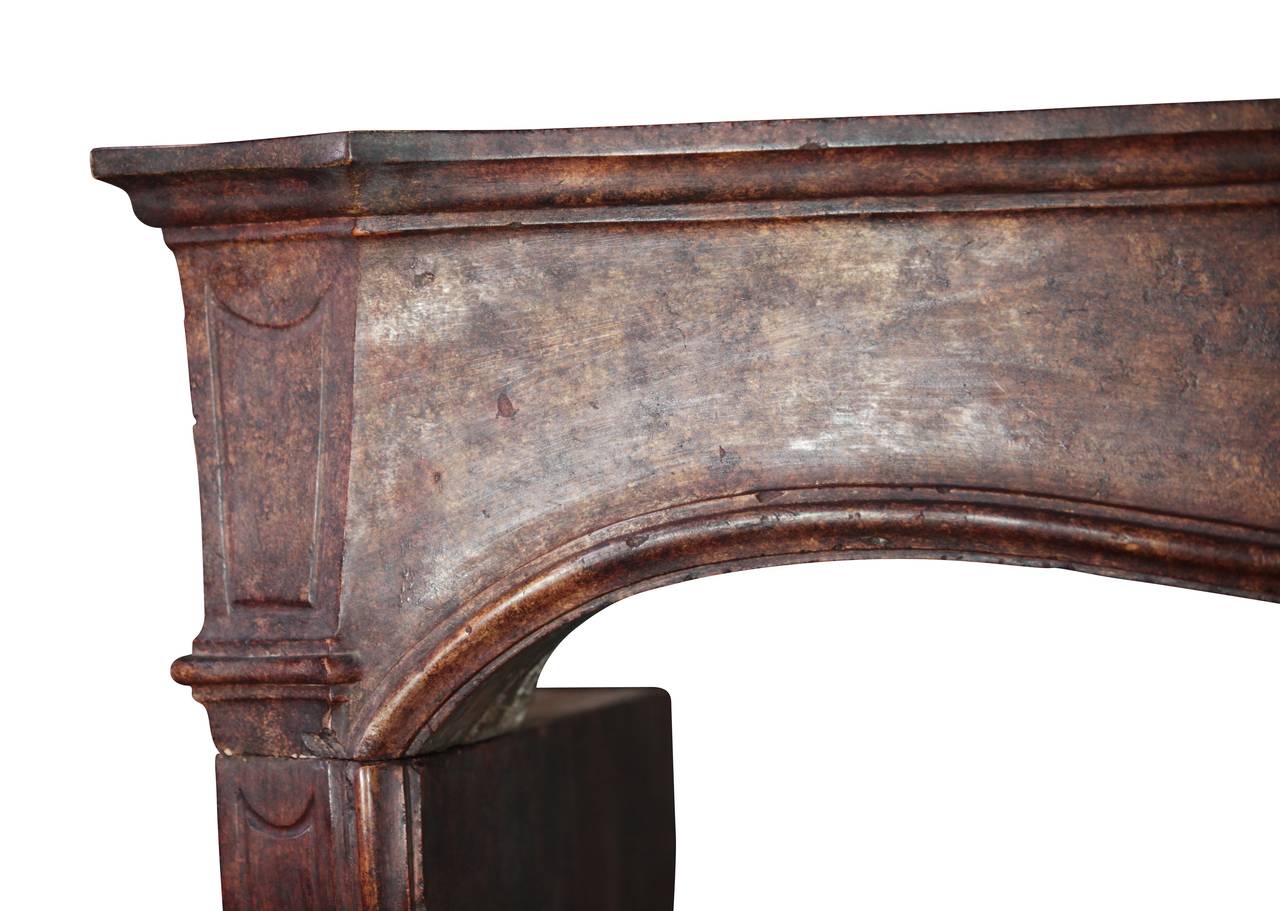 The dark red patina of this original antique fireplace surround gives it a rich depth. It was built in the Regency period with a very fine carved detail on the middle of the front. The mantel is in perfect condition.
Measures:
197 cm EW