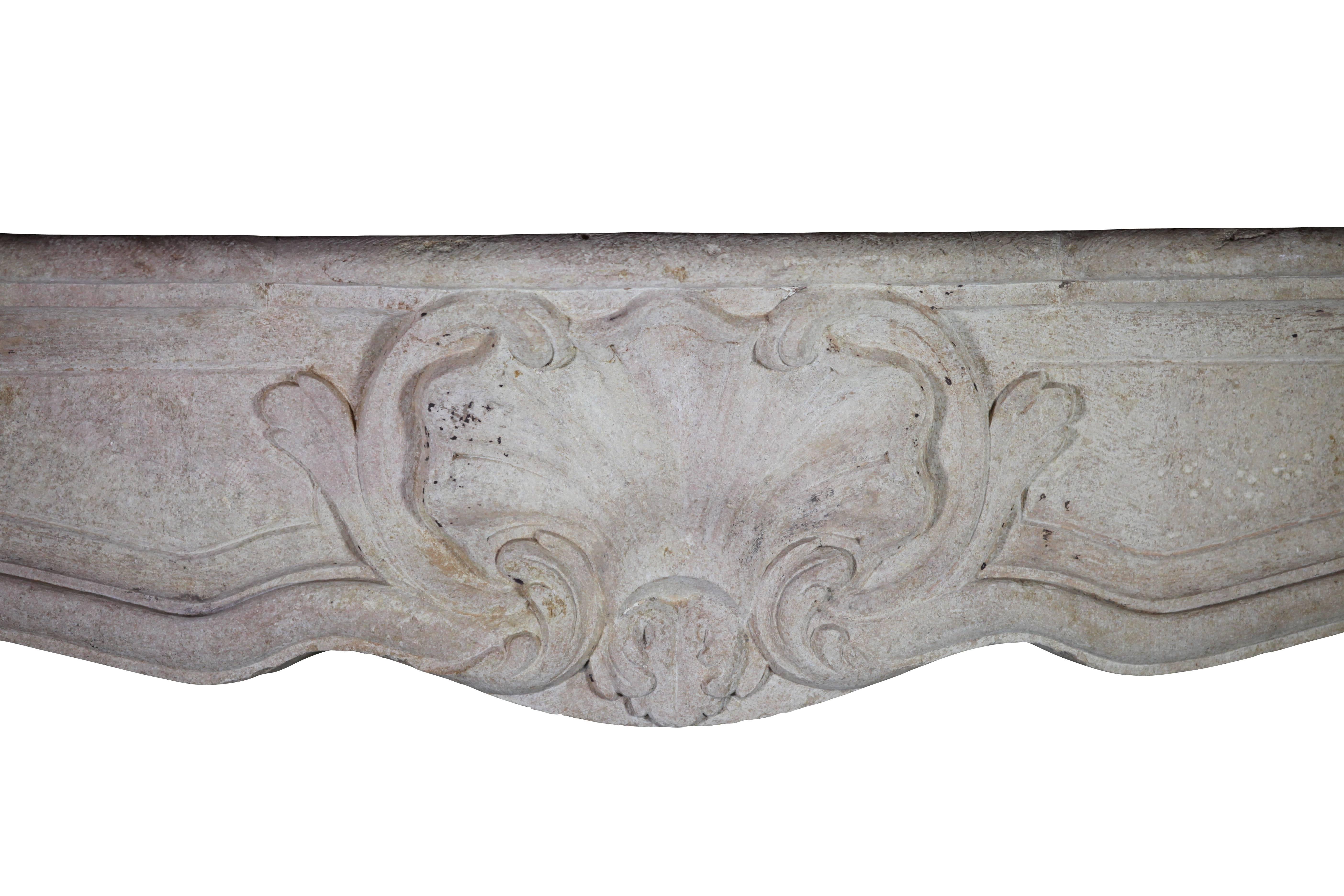 This fireplace surround has a very nice central LXV motif and a richly carved front. A classic Louis XV decorative country fireplace. The limestone is a bicolor from the Burgundy region. It gives this piece an extra twist.
Measures:
159 cm EW