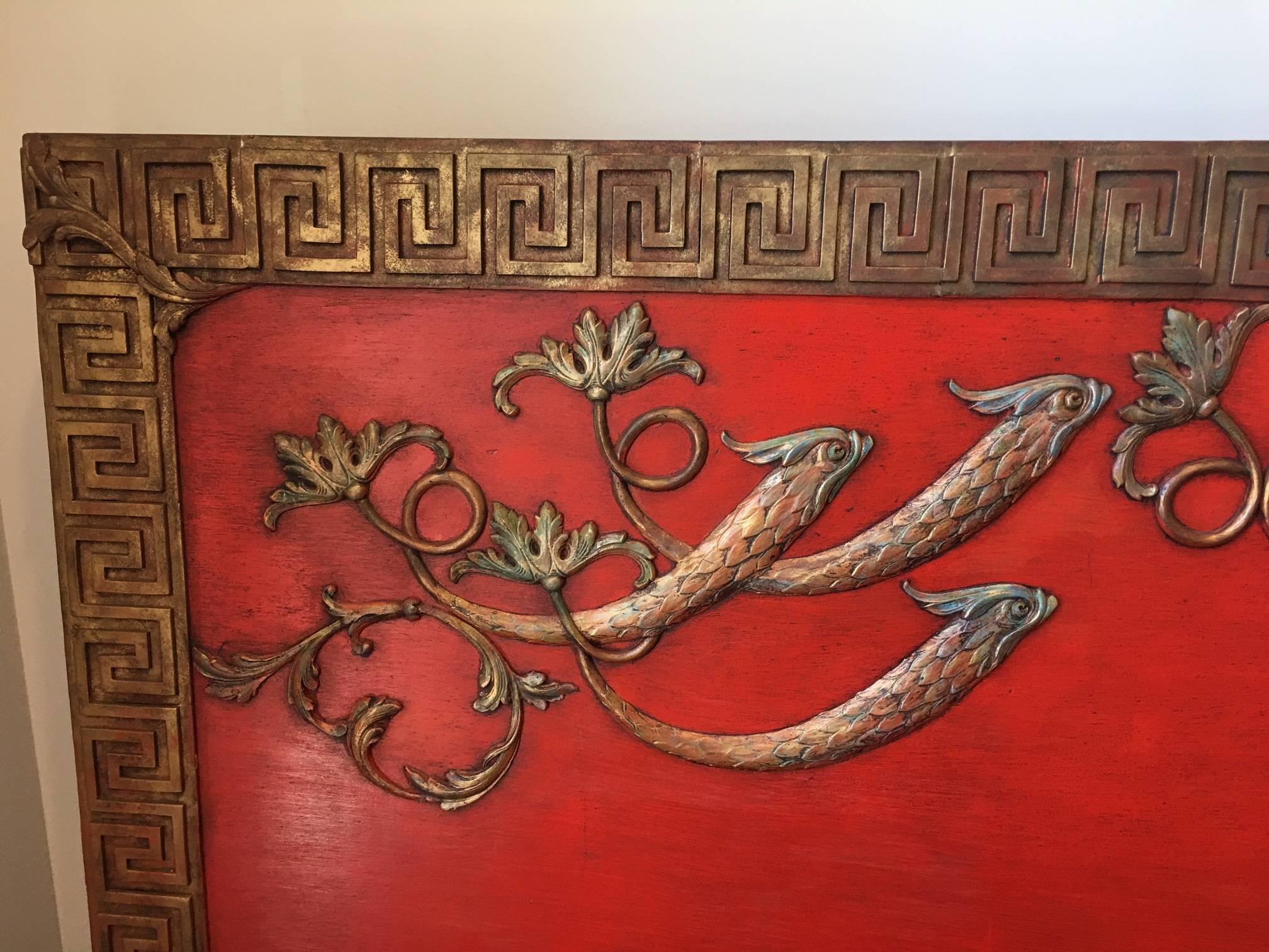 This piece is so striking I gasped when I saw it. It is beautiful queen sized wooden headboard with applied Greek Key, leaves, and fish/birds/dragon like creatures in a bronze tone. This headboard is in perfect vintage condition and is incredible