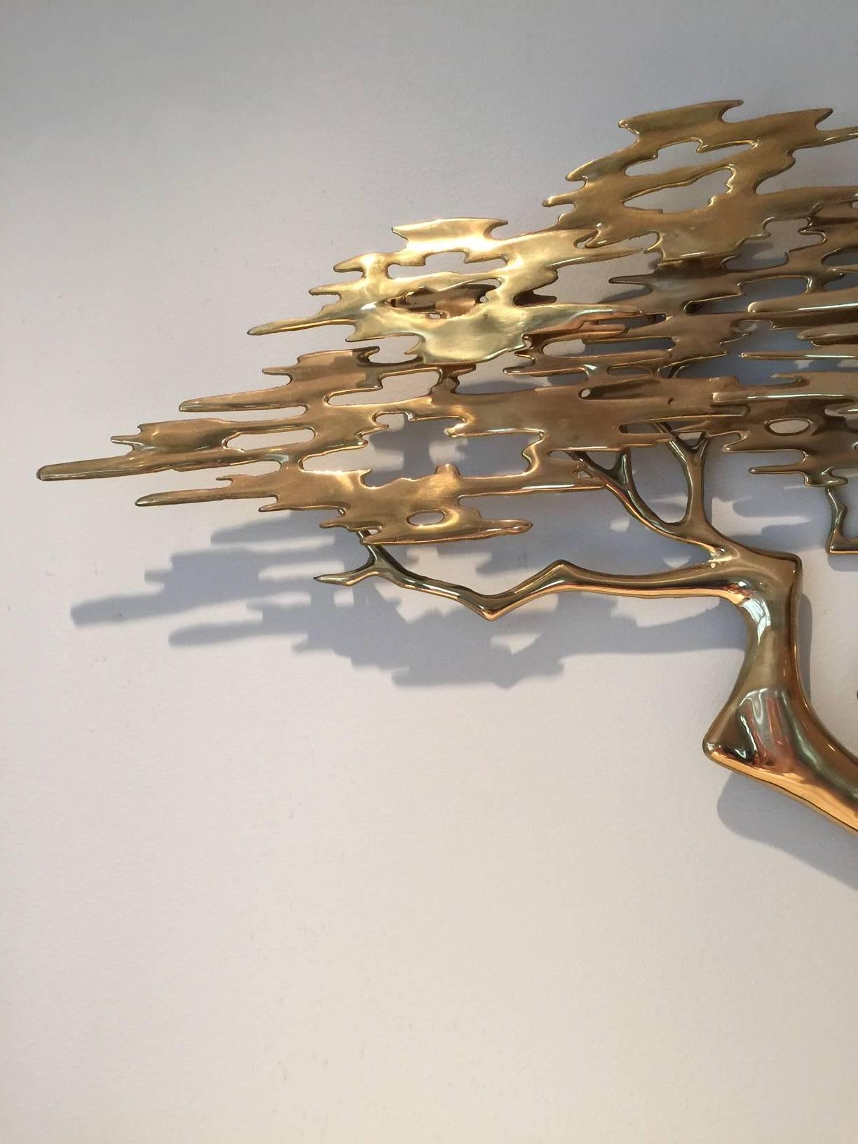This excellent mid century wall sculpture is in great condition and is signed by artist 
