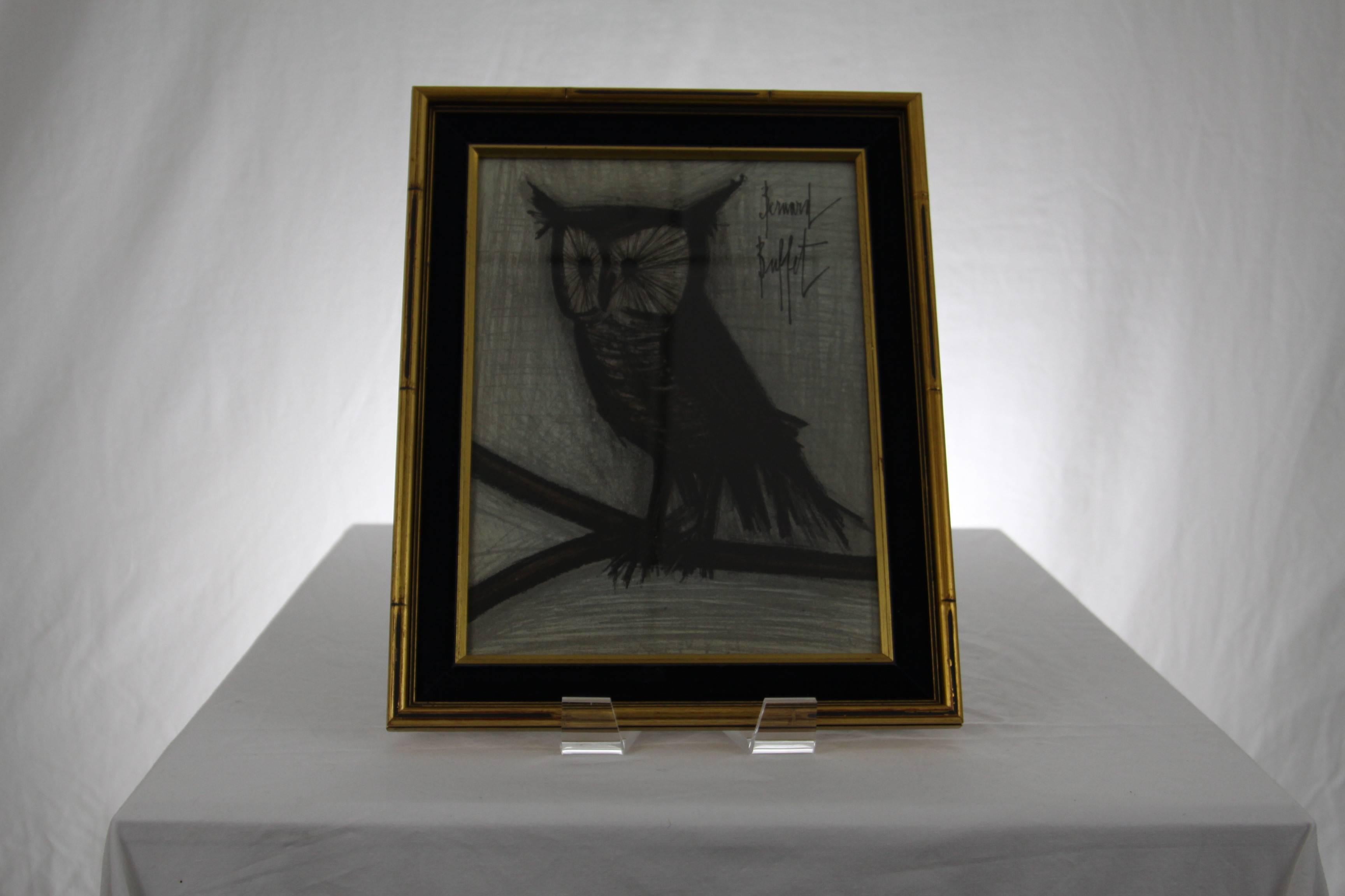 This original lithograph of an owl on a branch is set in a gold faux bamboo frame. Bernard Buffet was born in Paris, France on July 10, 1928. He entered the Ecole des Beaux Arts in 1944 but worked mostly in solitude. He obtained an exhibition at the