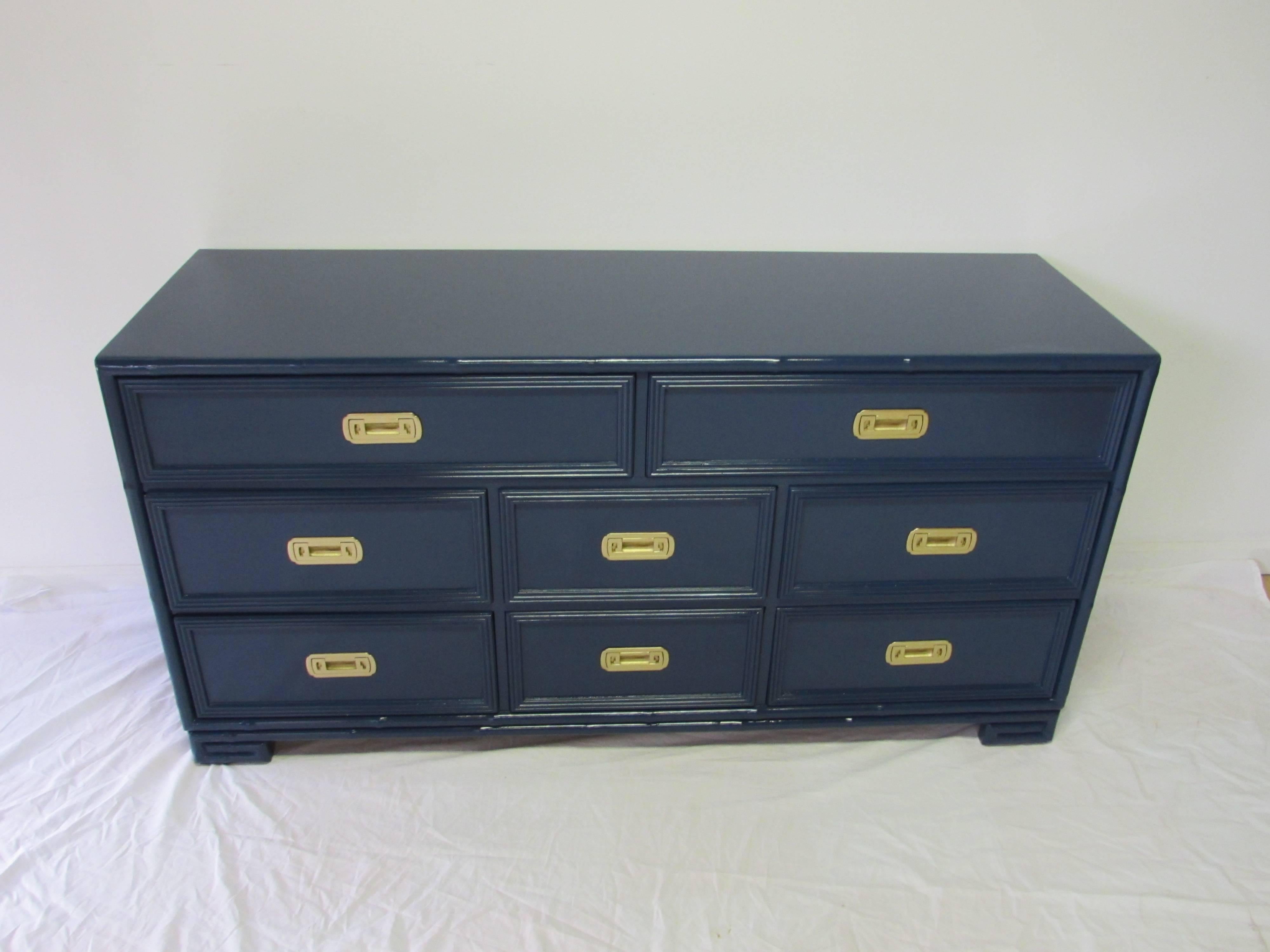 Drexel faux-bamboo chest of drawers lacquered in blue with high-gloss finish on a Greek key base. Eight dovetailed drawers adorned with brass Greek key hardware.