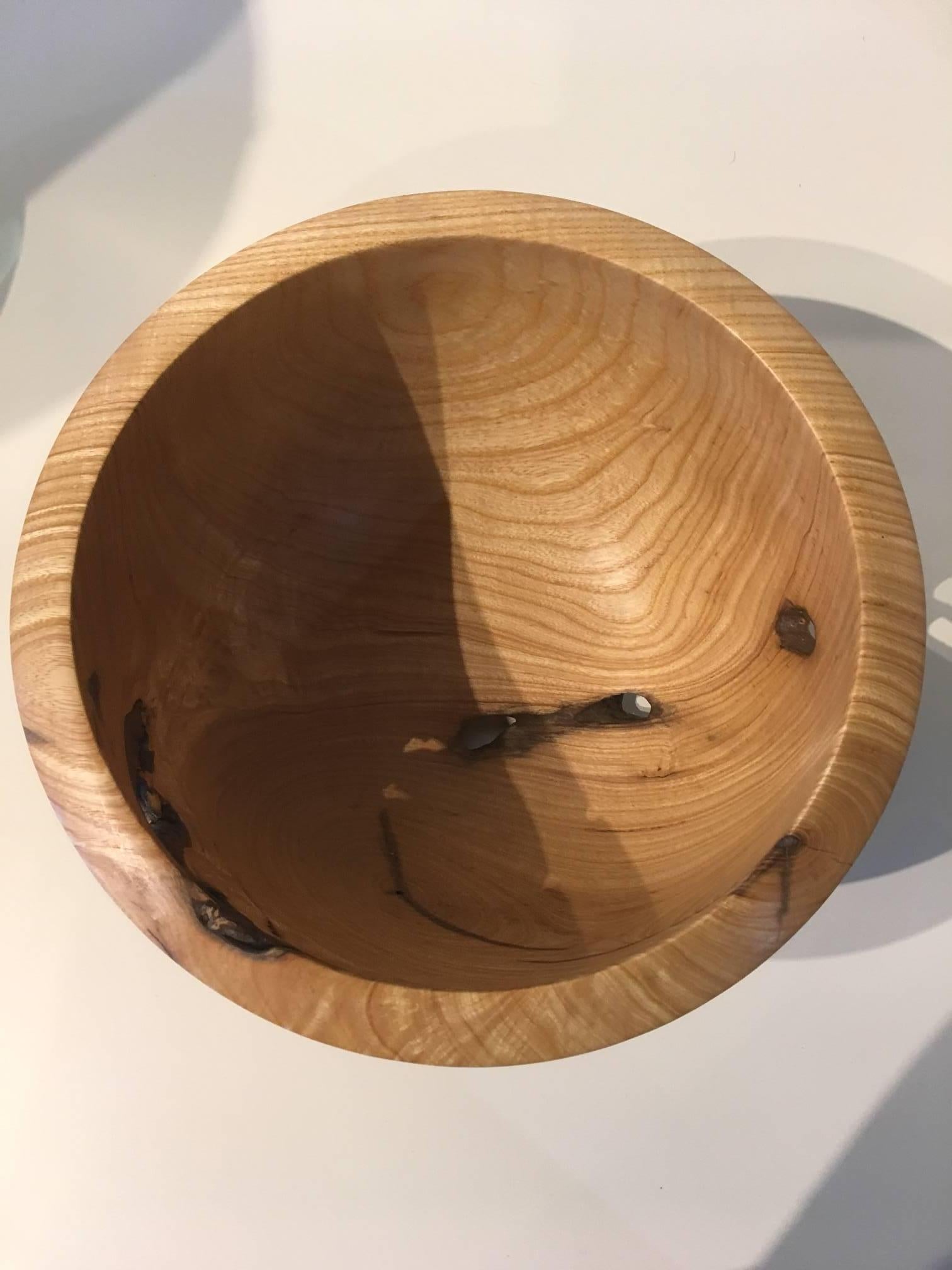 Lovely ash bowl handcrafted by a North Carolina artisan. Food safe, but also great for its sculptural value and a great display piece.
