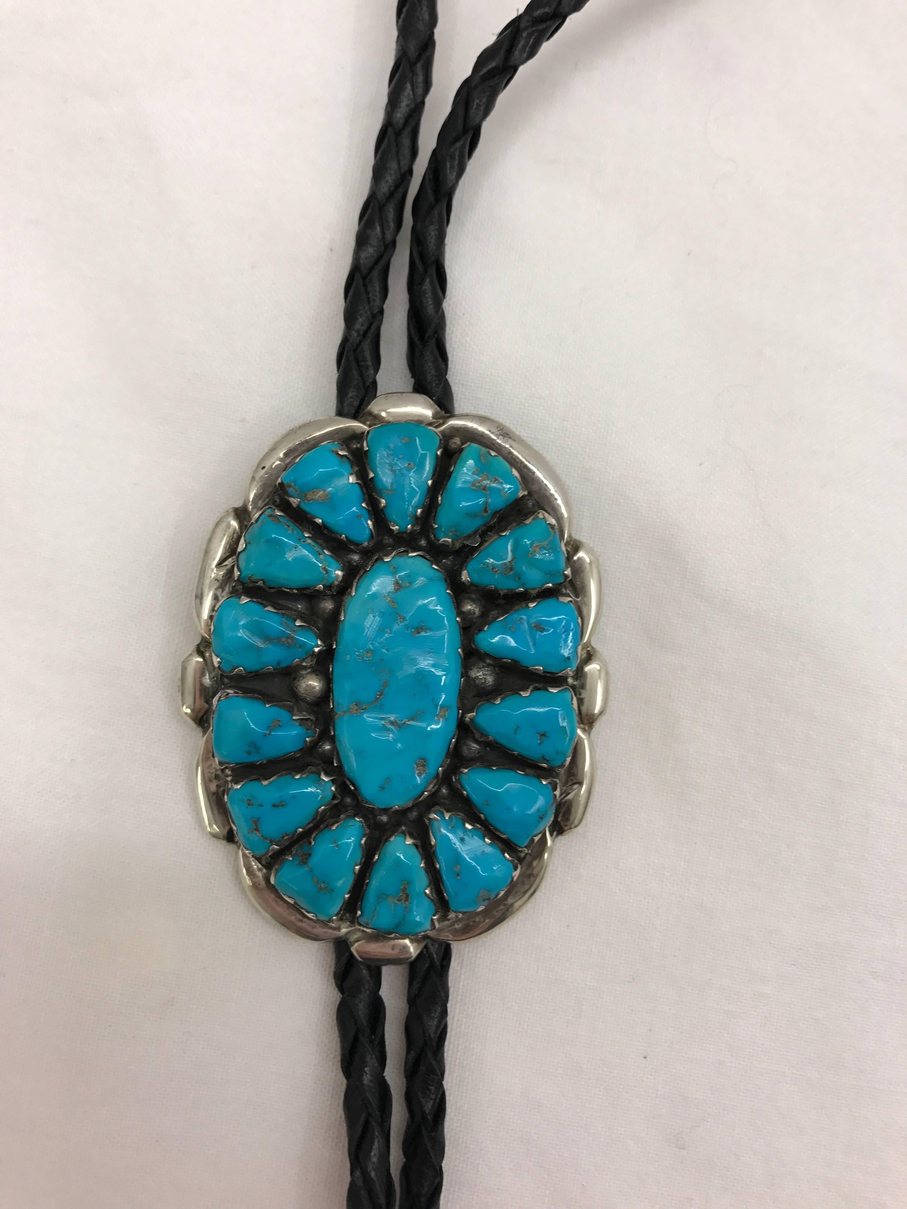 Vintage Navajo Indian blue turquoise and silver bolo tie or lariat by Alvina Quam Zuni from the 1960s. Signed on reverse.