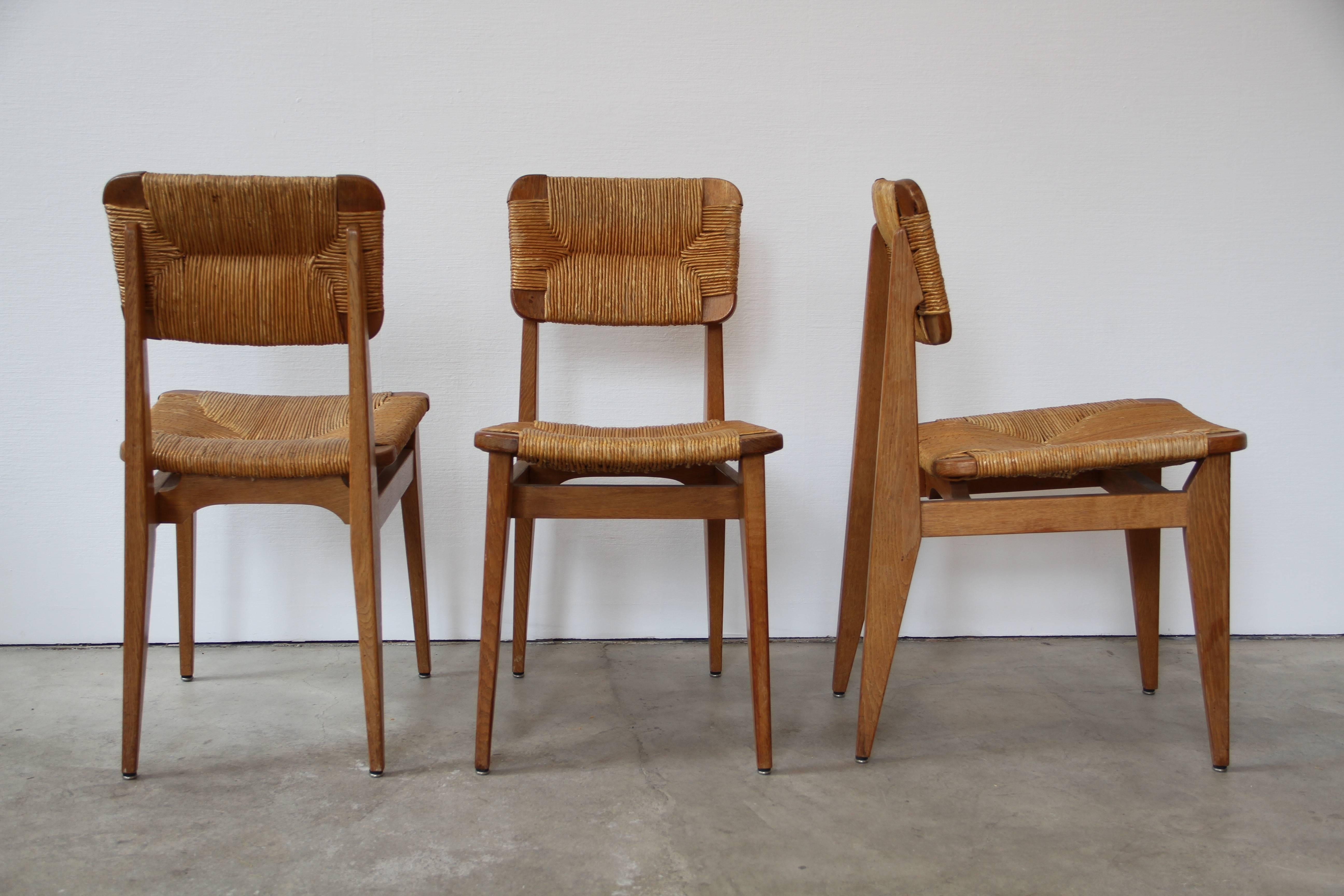 Set of six chairs by Marcel Gascoin
in oak and original straw
this model was designed and 1947

Really rare to found because was made exclusively on order.