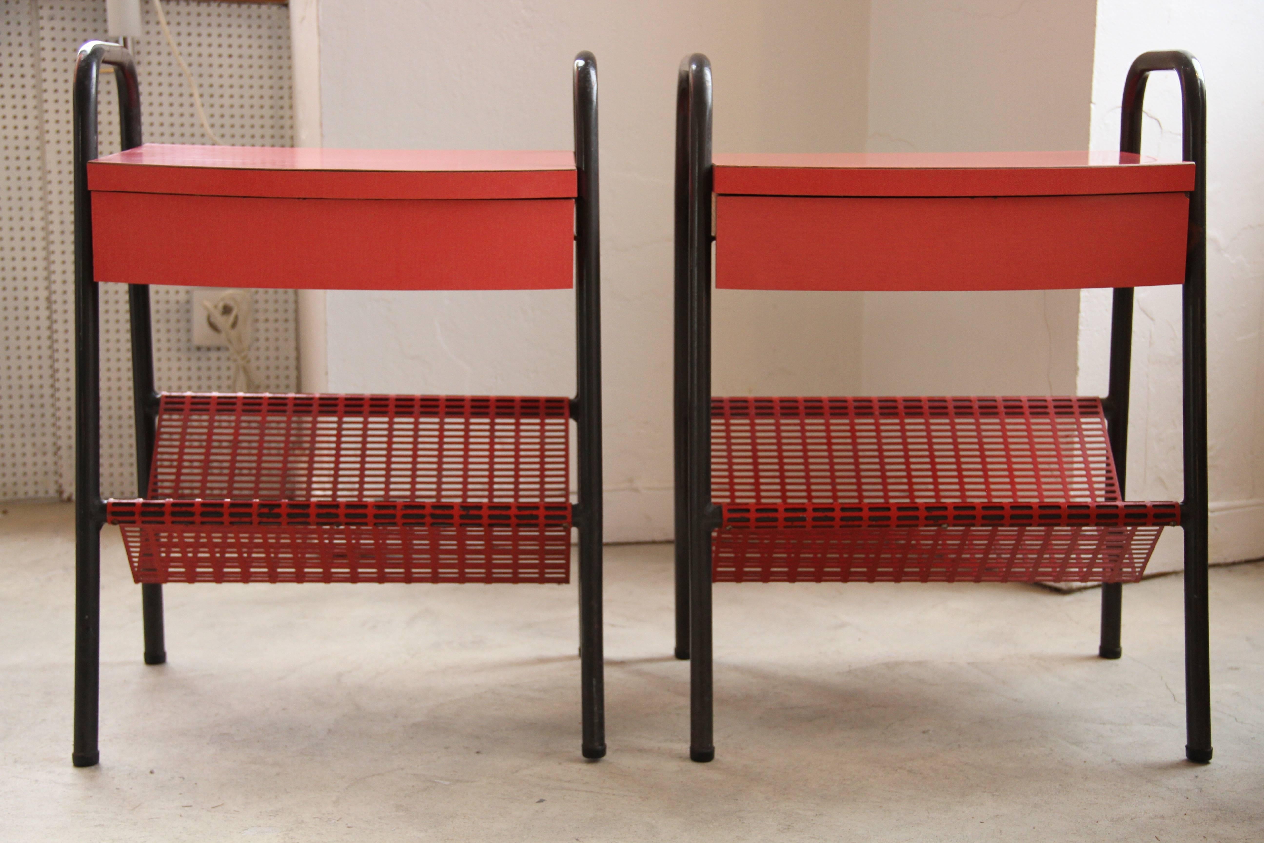 set of 2 nights stands designed by Jacques Hitier 
edited by Tubauto 1953 France

perforated red steel, grey (canon de fusil) enameled steel,
and red Formica

lit: Jacques Hitier, Modernité Industrielle 
de Pierre Gencey, PIQPOQ édition
